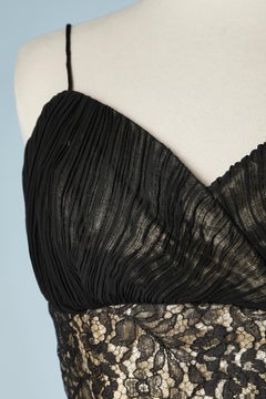 Cocktail dress in black chiffon and lace with gold lurex lining Circa 2000