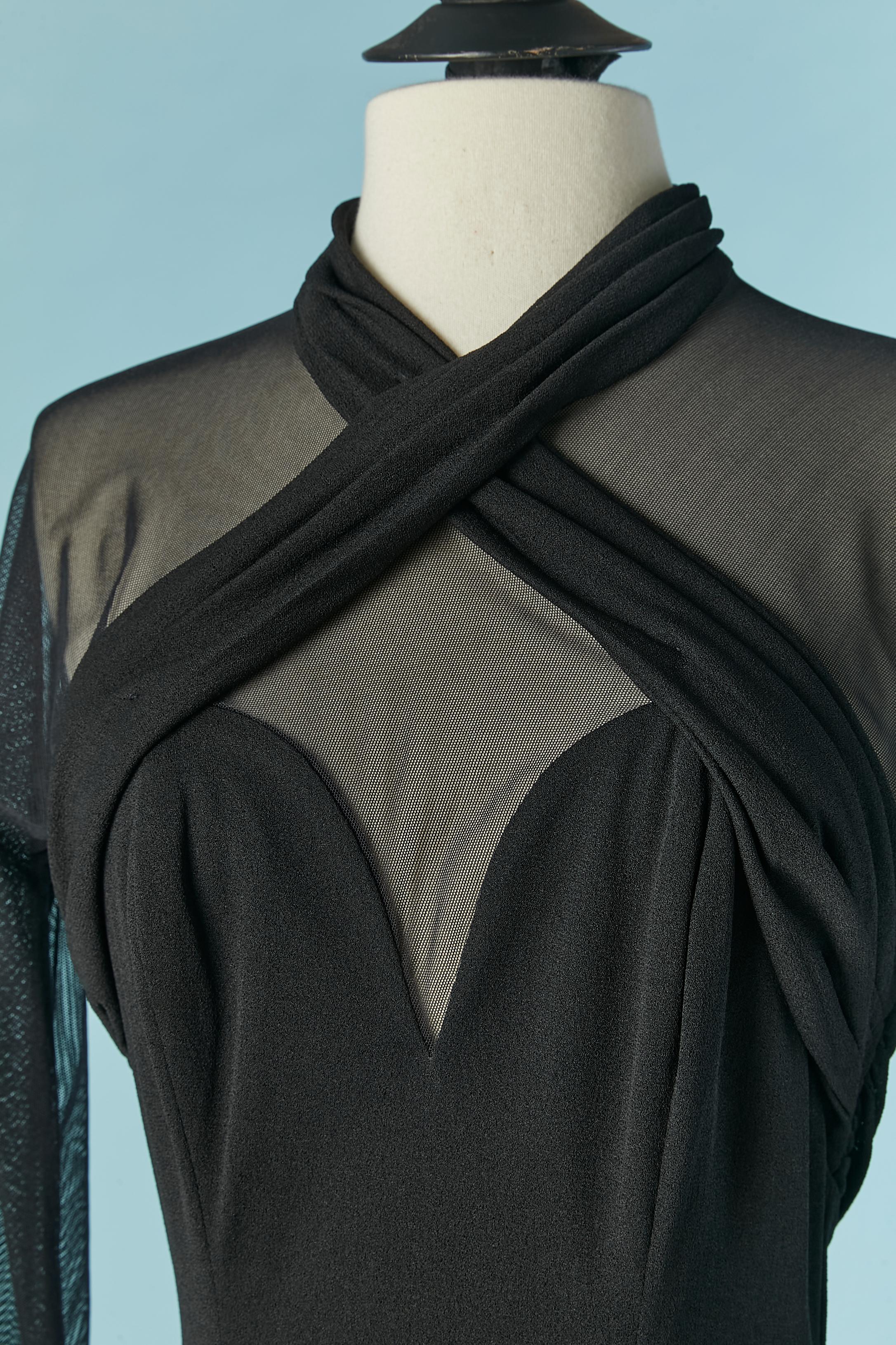 Cocktail dress  in black tulle stretch and jersey, draped on the front . Main fabric composition: stretch see-through tulle, polyamide, Lycra 
Zip and hook&eye closure on the middle back. 
SIZE M 