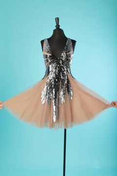 Cocktail dress in silver sequin on a nude tulle dress Mattiolo