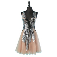 Cocktail dress in silver sequin on a nude tulle dress Mattiolo 
