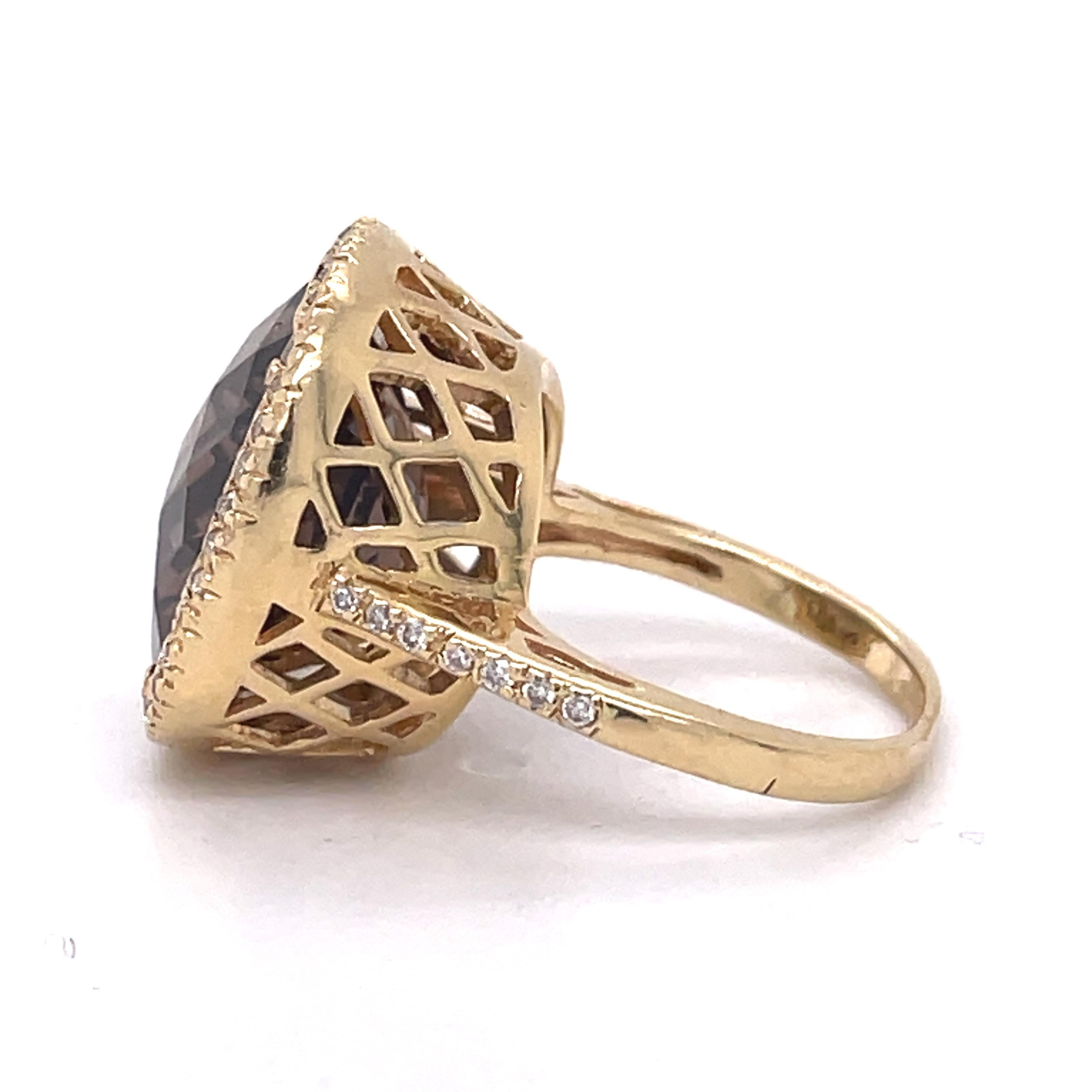 Jewelry Material: Yellow Gold 14k (the gold has been tested by a professional)
Total Carat Weight: 10.27ct (Approx.)
Total Metal Weight: 7.54g
Size: 5.5 US \ 16.30MM (inner diameter)

Grading Results:
Stone Type:  Topaz
Shape: Cushion
Carat: 10ct