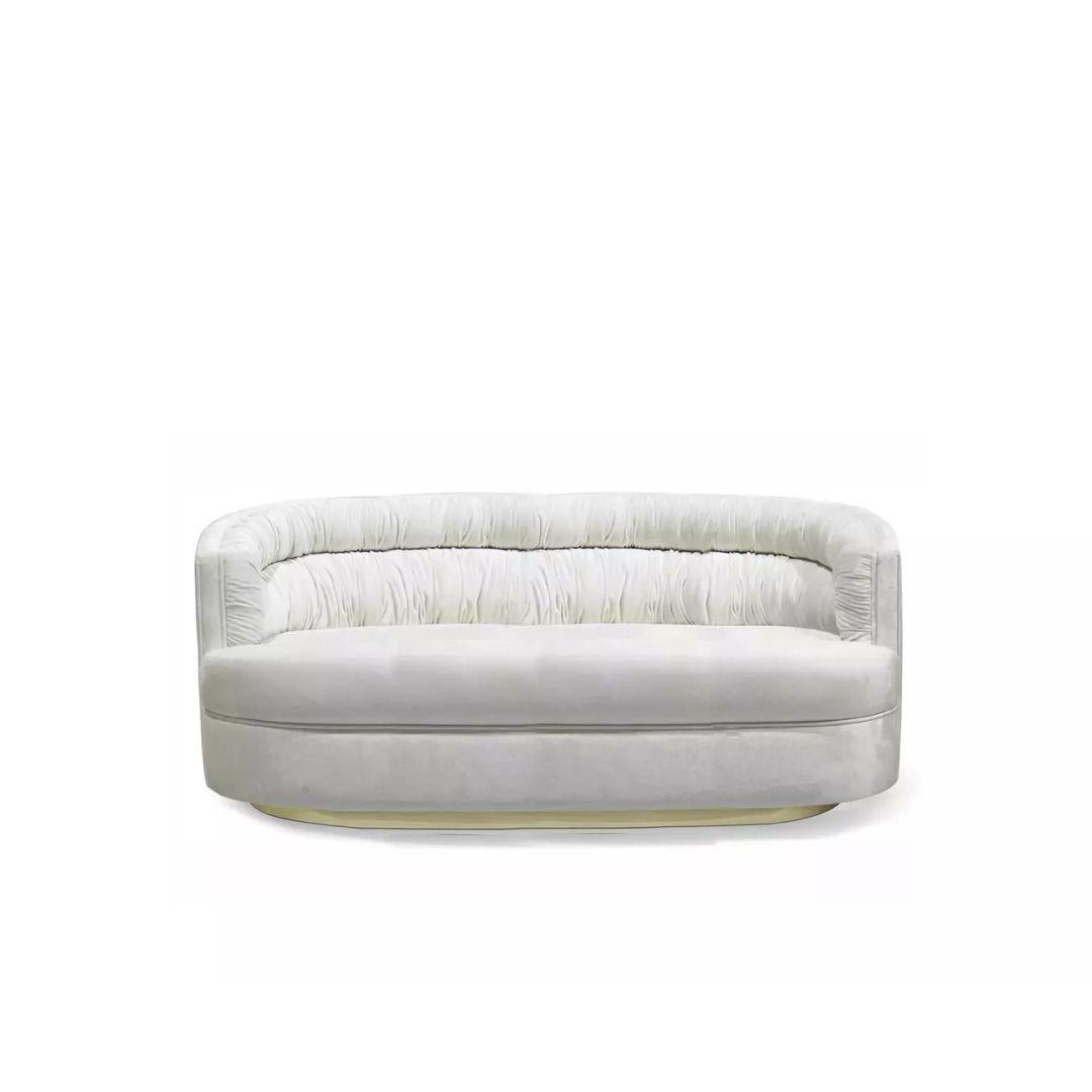 Like the olive to a martini, sipping cocktails and lounging in luxury go hand-in-hand. The plush body of the Cocktail sofa hugs your every curve while you softly melt into the creamy upholstery fabric. Cheers!

As Shown
Upholstery: Lux Velvet Bright