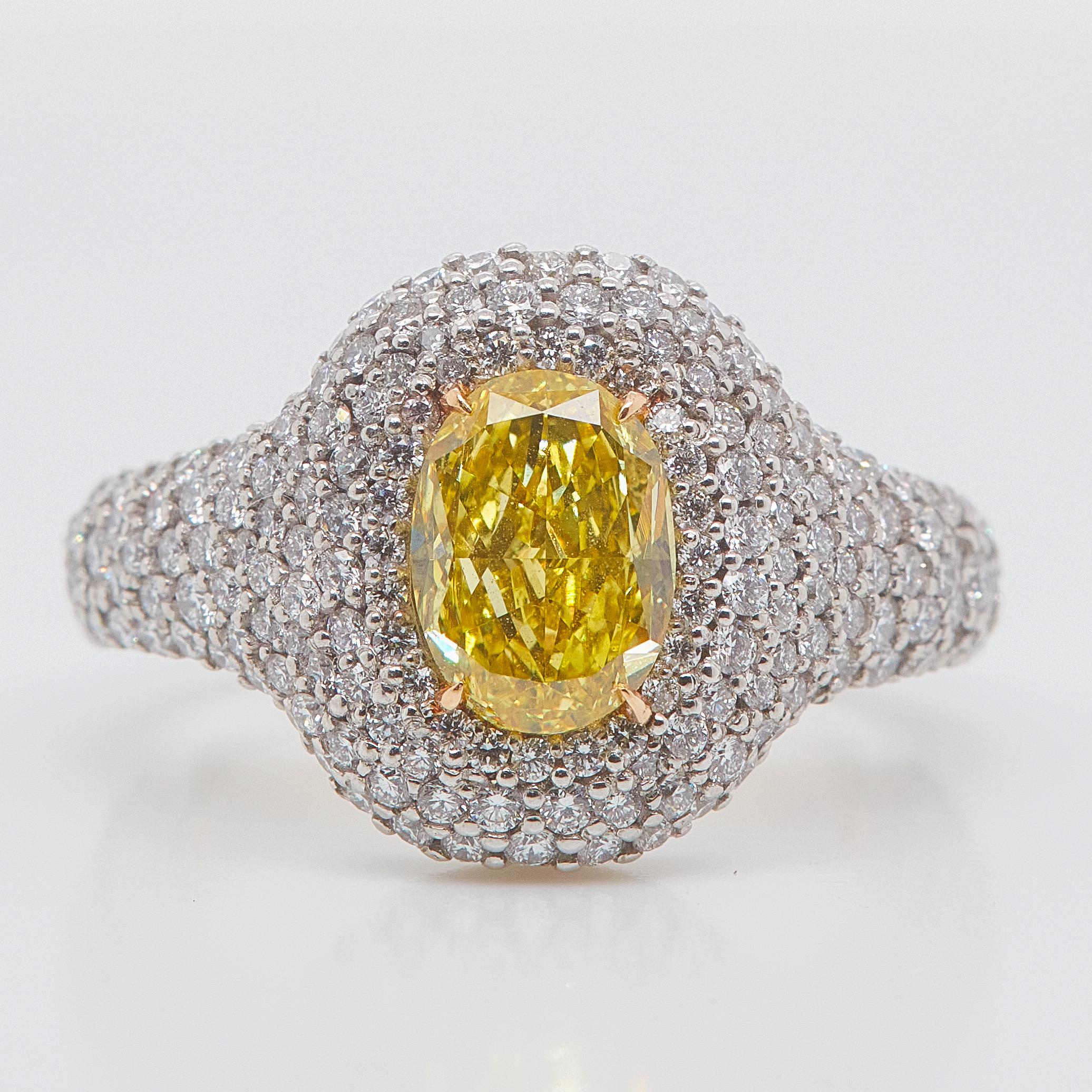 Contemporary Cocktail Ring 1.70 Carat Fancy Vivid Yellow Oval Cut Diamond, GIA Certified For Sale