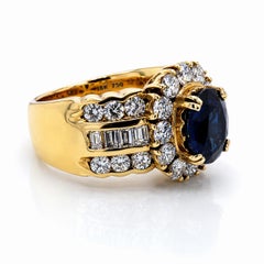 COCKTAIL RING 1.89 Cwt. Sapphire & 1.68 Cwt Baguette Round Diamonds in 18k gold.