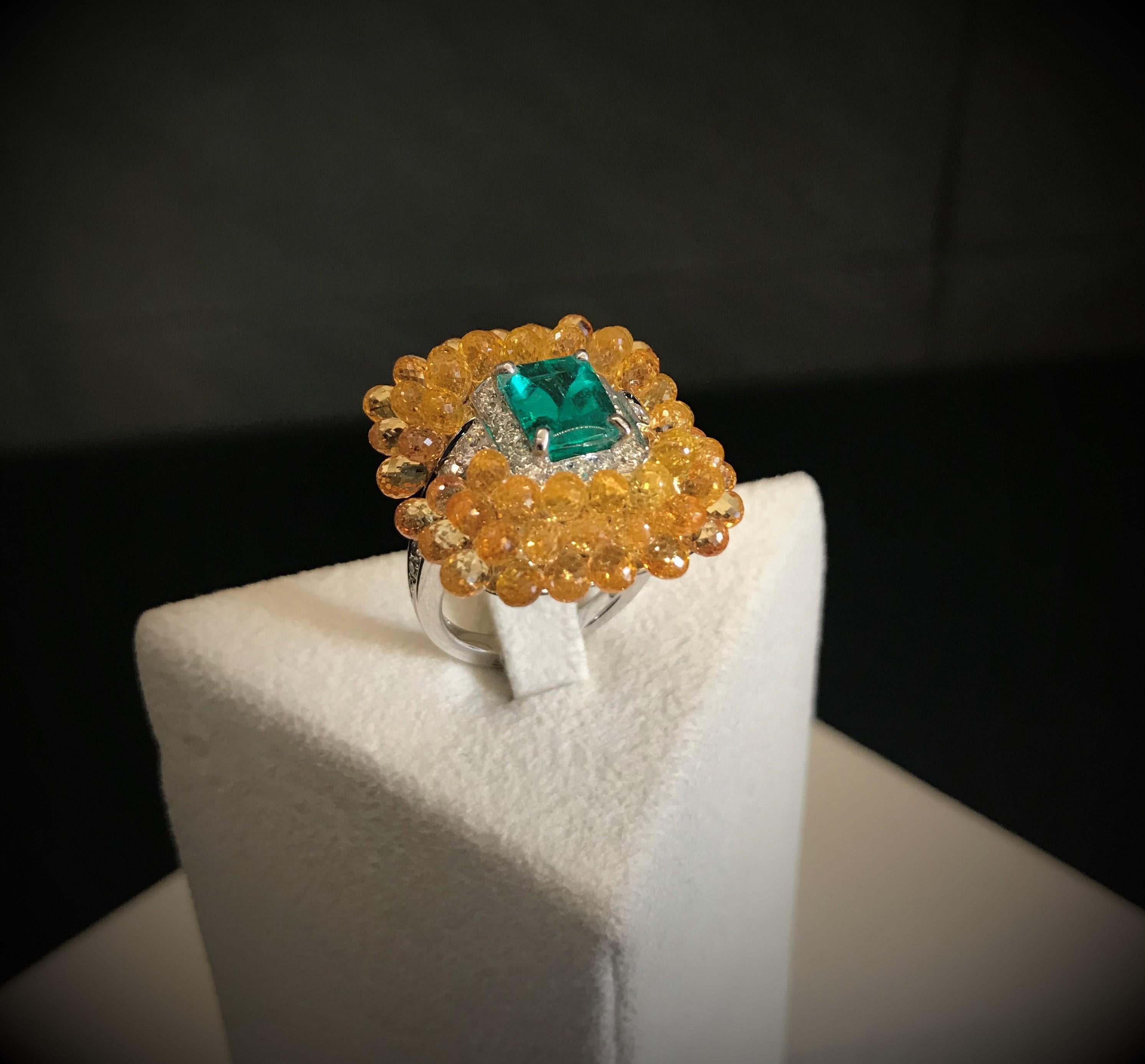 Briolette cut sapphires are only the wonderful pretext to adorn a splendid and glaming rare fancy cut emerald.

Diamonds ct 0.83
Emeralds ct 2.09
Sapphires total ct 20.51

Ring size: EU 13 (Resizable for 2/3 sizes)
