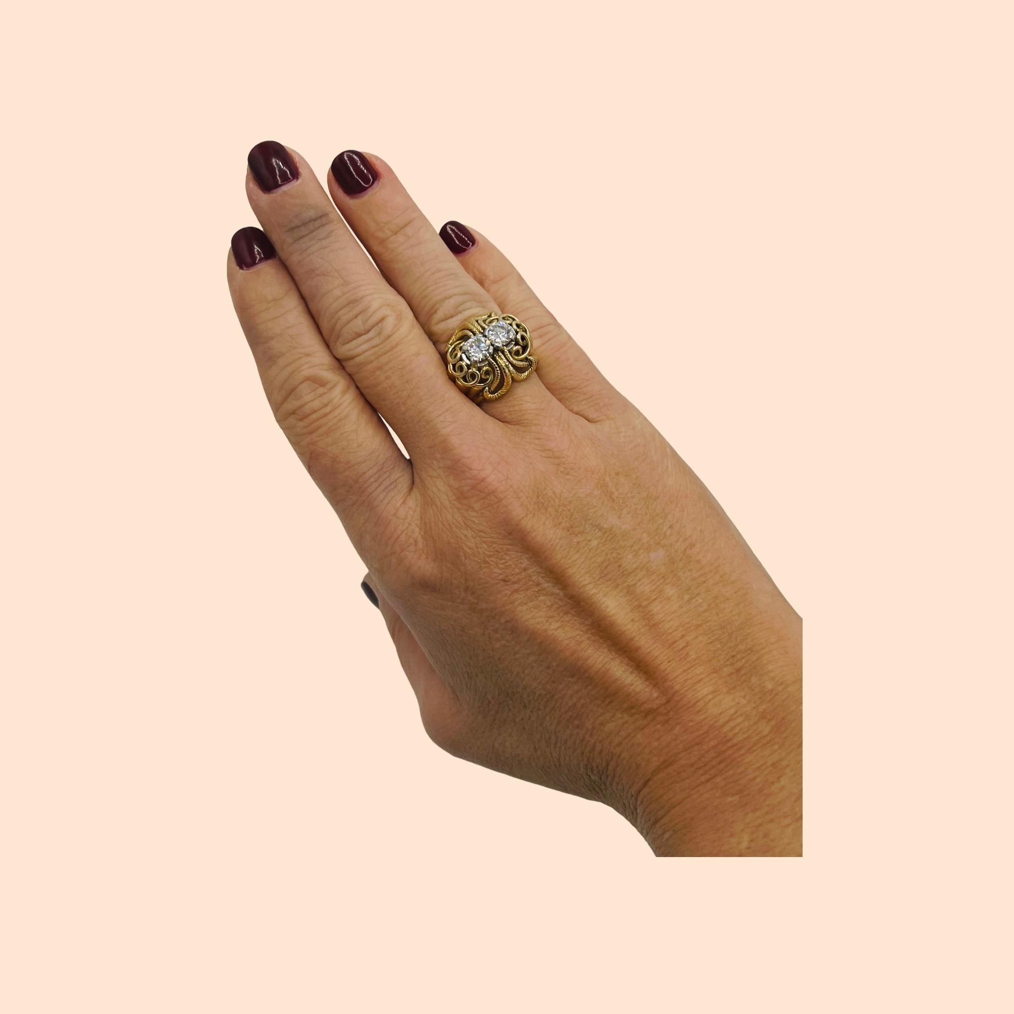 superb cocktail ring from the 1950s in 18 carat gold, set with two modern cut diamonds
( 2 diamonds for 1 carat )
weighing 12.68 grams, size 52.5 or 6
width of the ring: 1.8cm
size reduction offered