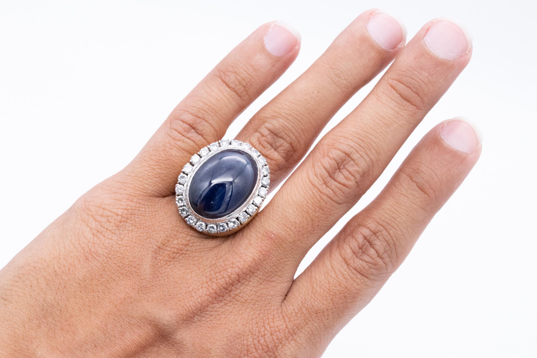 An statement cocktail ring with natural gemstones.

A massive, huge contemporary unisex piece, crafted in solid 18 karats yellow gold with .950/.999 platinum settings. The main body of the ring is finished with brushed areas.

Bezel set on top, with