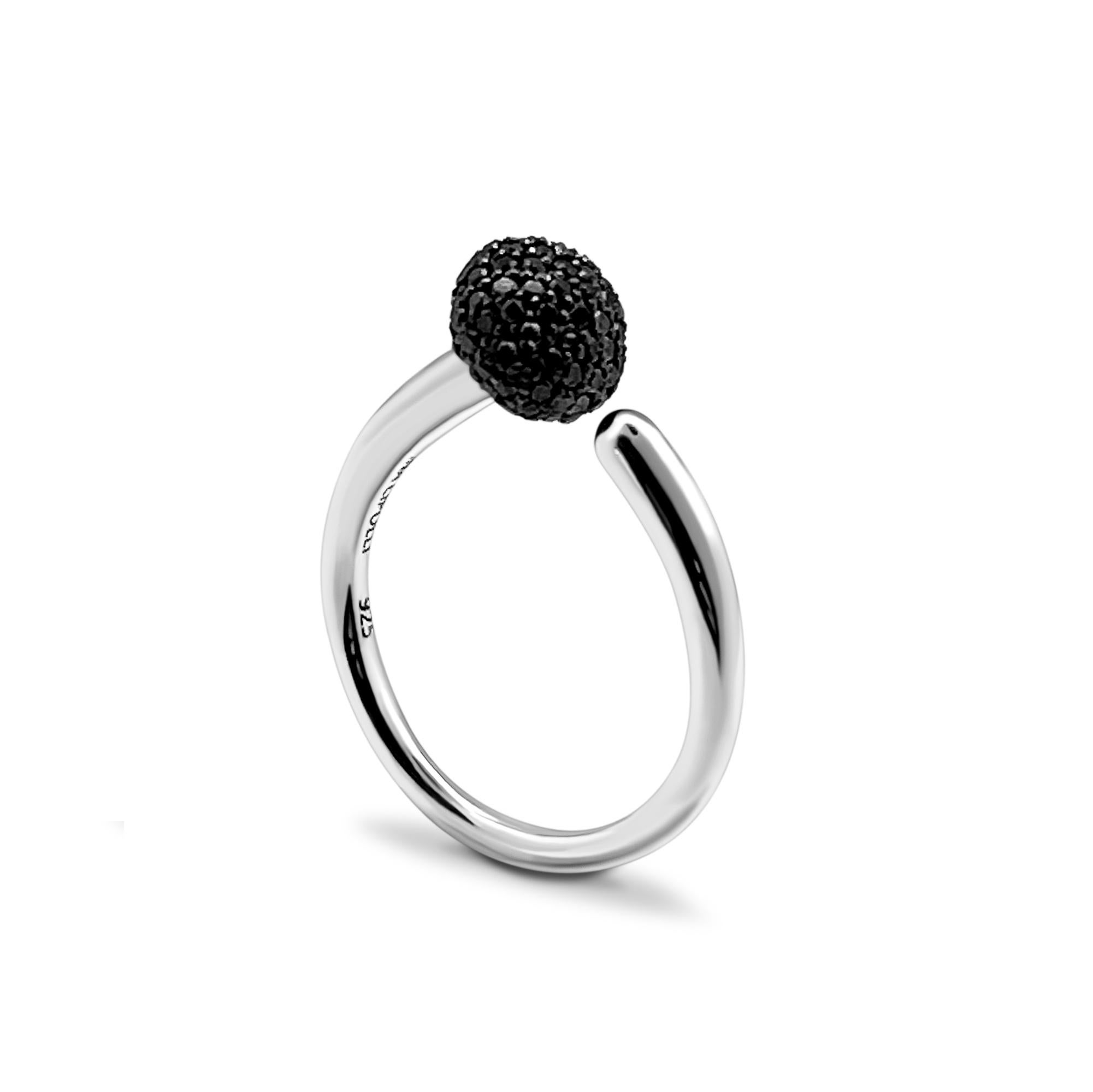 Contemporary cocktail ring in polished silver, set with black diamonds pave. Elegant and modern design inspired by the boldness and power of sterling silver metal. Gemstones: black diamonds (round 1 mm, 90 pieces). Out of stock at the moment.