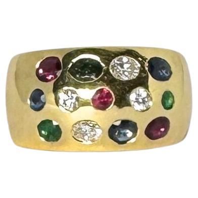 Cocktail ring made of 18 carat gold with diamonds, rubies, smaragd, sapphire For Sale
