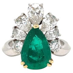 Bague cocktail - Mauboussin, années 1960, AGL, émeraude colombienne de 2,60 carats et diamants.