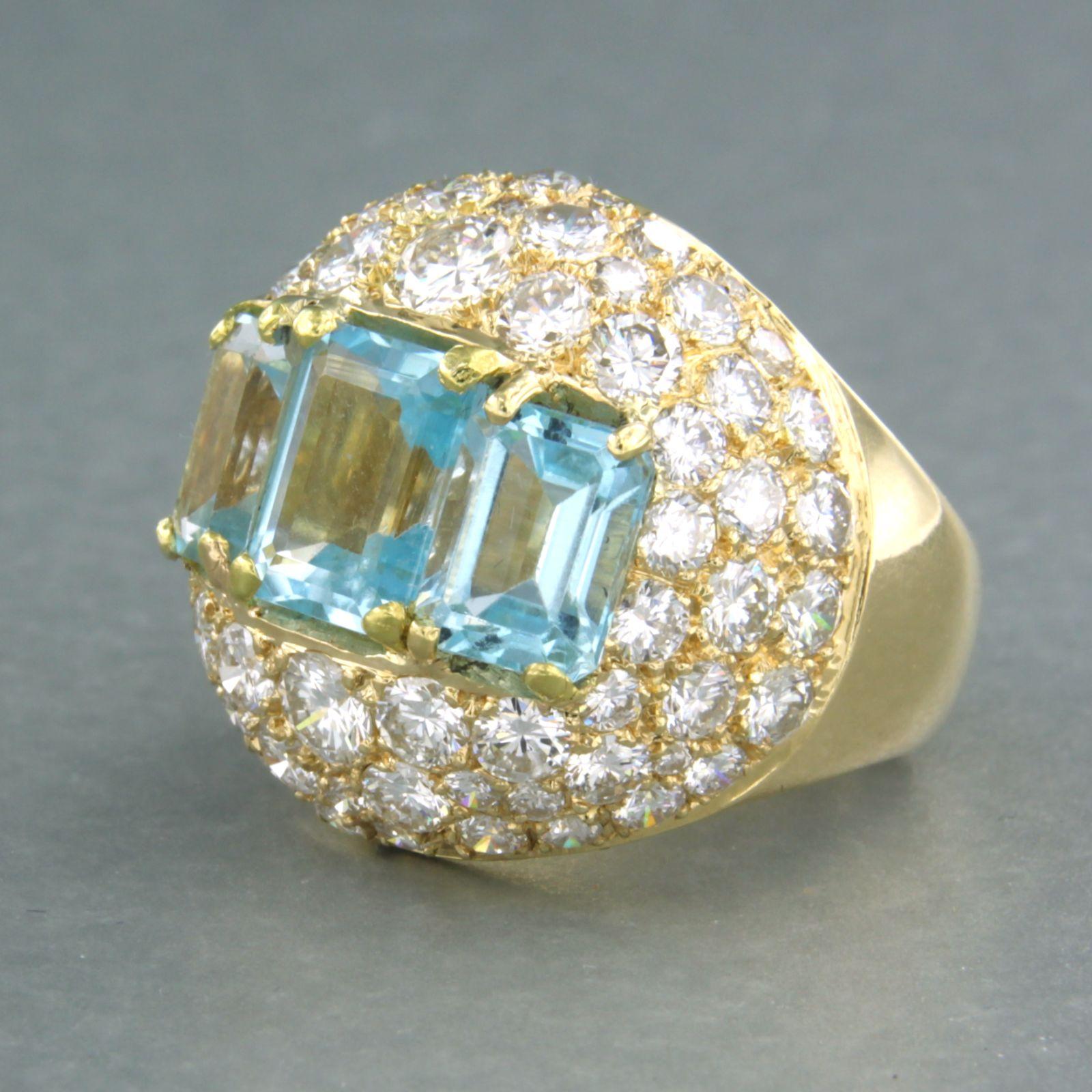 18k yellow gold ring set with blue topaz and brilliant cut diamonds. 5.30ct - F - VS/SI - ring size U.S. 6.5 - EU. 17(53)

detailed description:

the top of the ring is 2.2 cm wide by 9.3 mm high

total weight 13.8 grams

ring size US 6.5 - EU.
