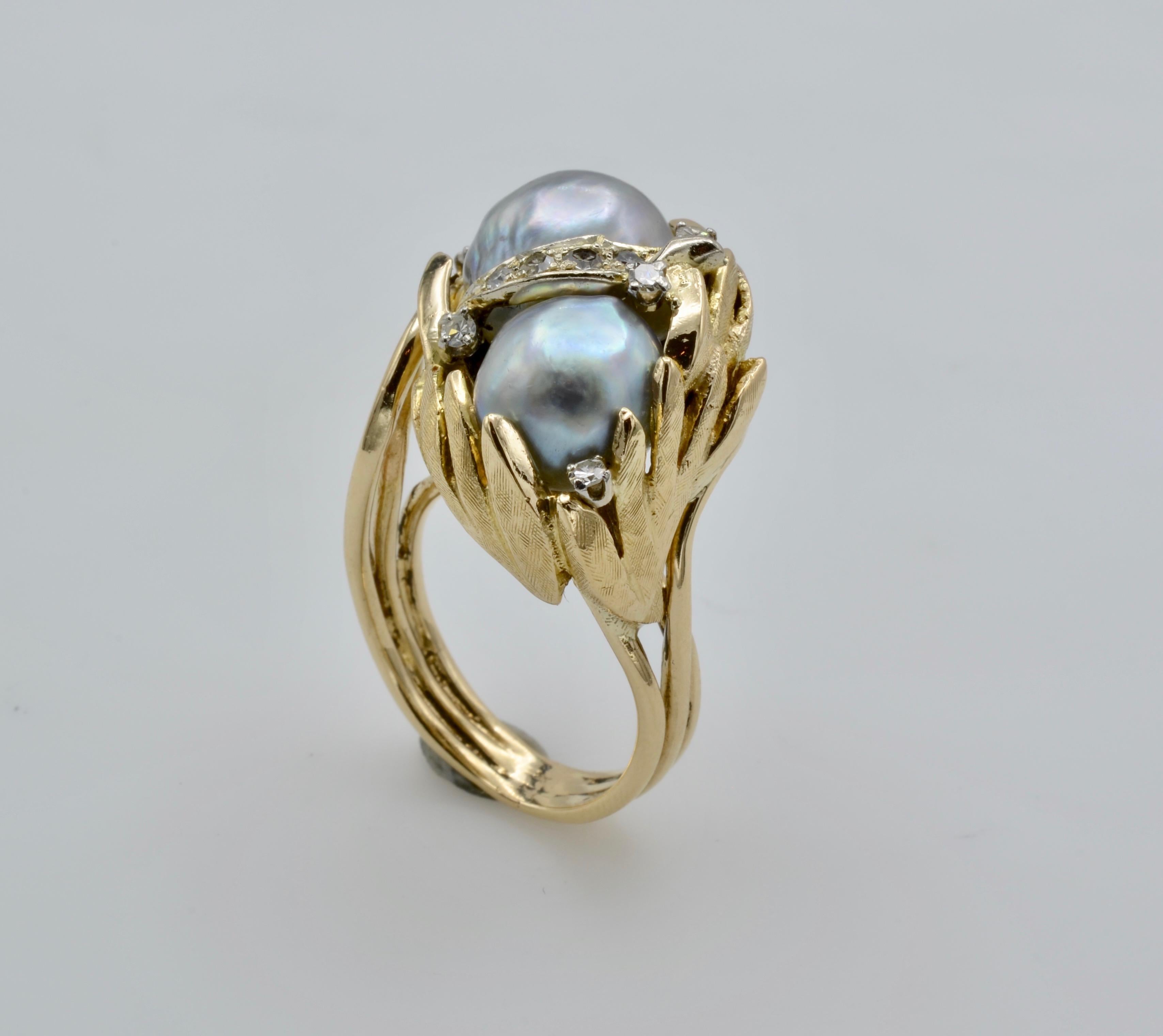 This stunning south sea pearl ring is magical. The leaves incorporating diamonds beautifully frame the luster of these dreamy blue pearls. They float in a sea of gold and diamond kelp. The ring is a size 6 3/4 and can be sized to fit your finger.