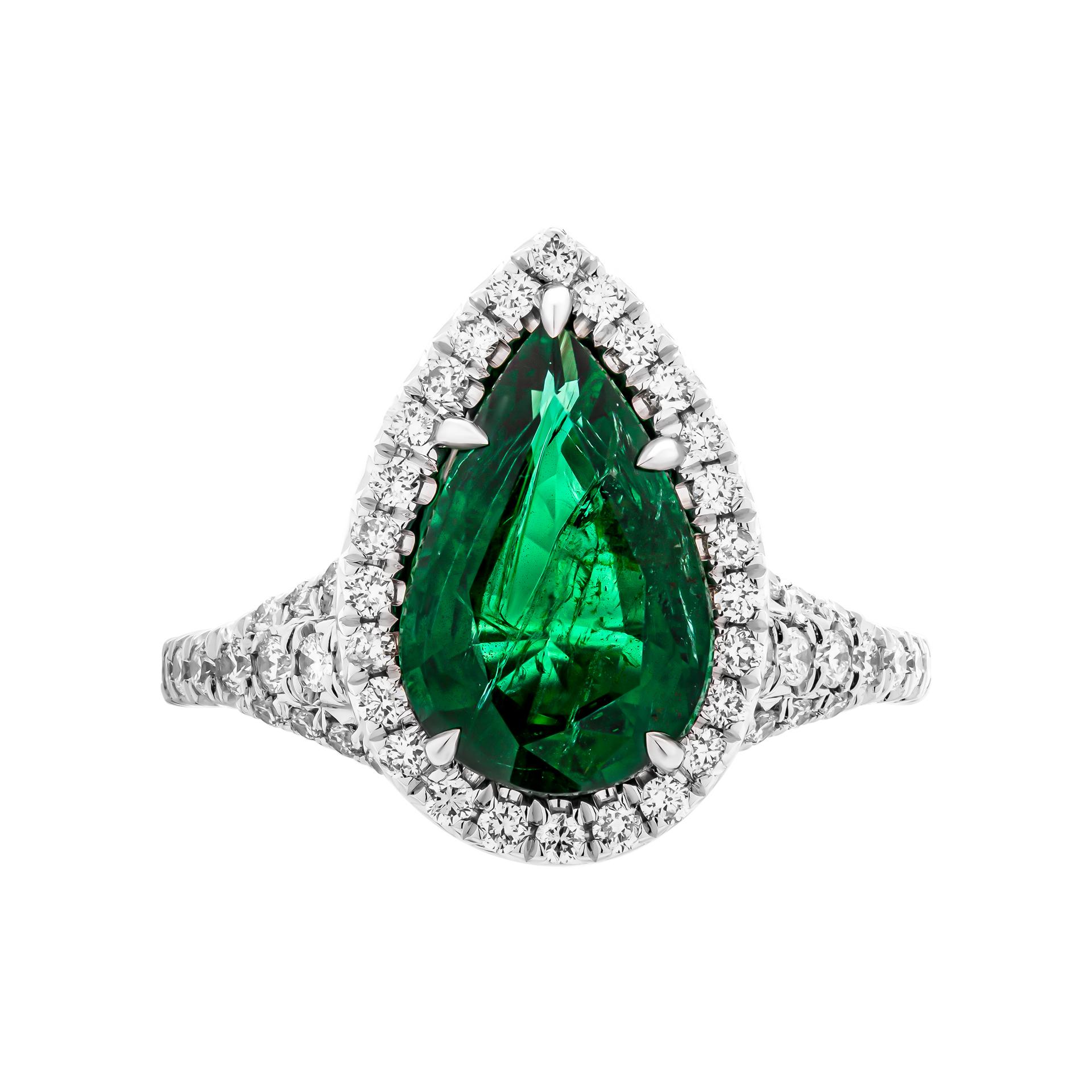  Ring in Platinum
With diamond shank: 3 ways split at the top & Diamond Halo around for pear shape: 2.16ct Green Emerald
 Total carat weight pave: 0,93ct 
size: 5.75