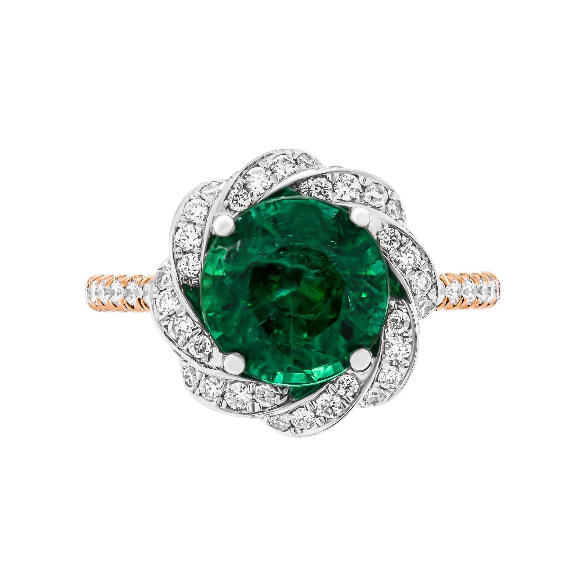 Engagement ring in PT950 & 14K Yellow Gold 
Twisted double edge halo & cathedral diamond shank with 2.60ct Round Green Emerald; 
Total carat weight of diamonds: 0.63
 Size: 5.5