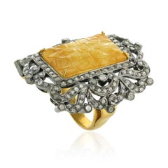 Cocktail Ring with Carved Yellow Sapphire Surrounded by Pave Diamonds
