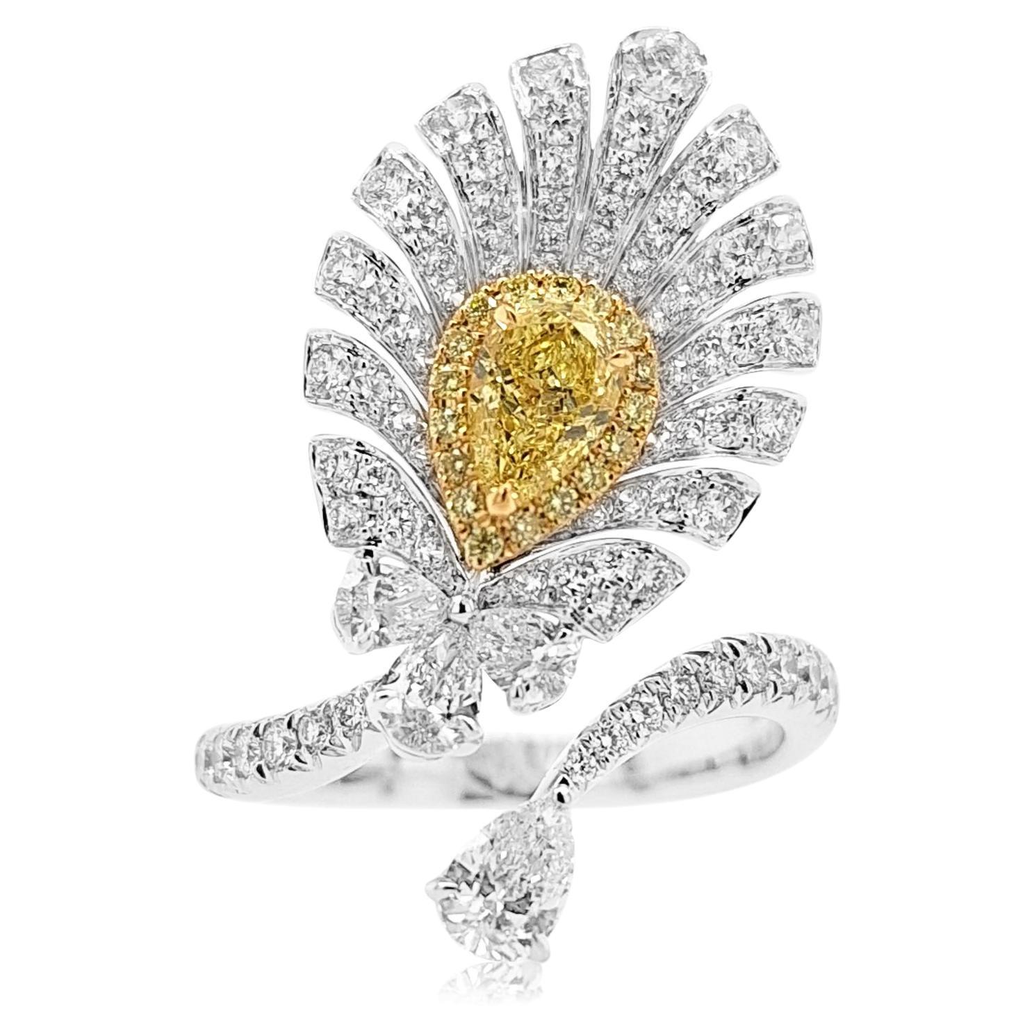 Cocktail Ring with GIA Certified Pear Shape Yellow Diamond and White Diamonds