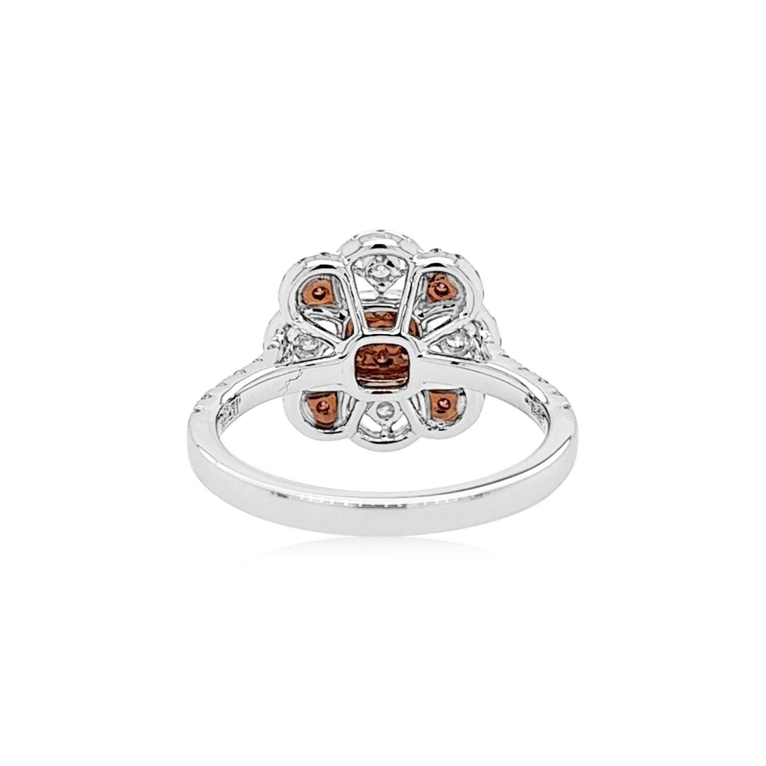 Contemporary Cocktail ring with Rare Pink diamonds and white diamonds, made in platinum For Sale