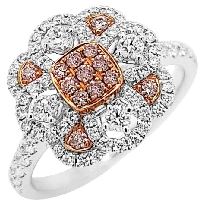 Cocktail ring with Rare Pink diamonds and white diamonds, made in platinum For Sale
