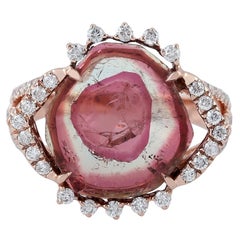 Bague cocktail en or 18 carats avec tourmaline entourée de diamants pavés
