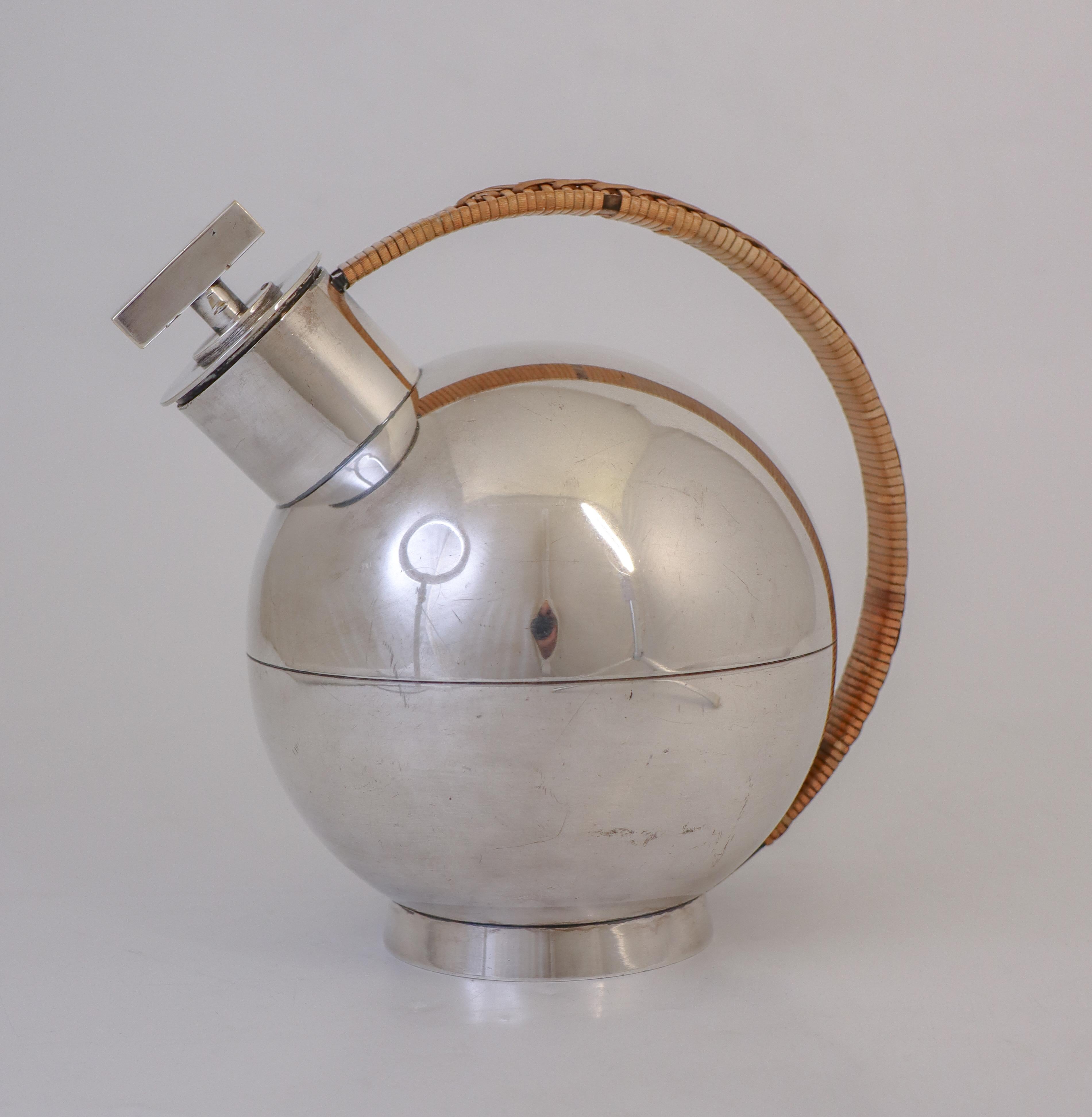 A stunning cocktail shaker designed by Sylvia Stave at C.G.Hallberg in Stockholm, Sweden in 1930s in classic art deco. It is in excellent condition except from some minor stains and dirt on the inside (not visible from the outside. It is 18 cm high. 