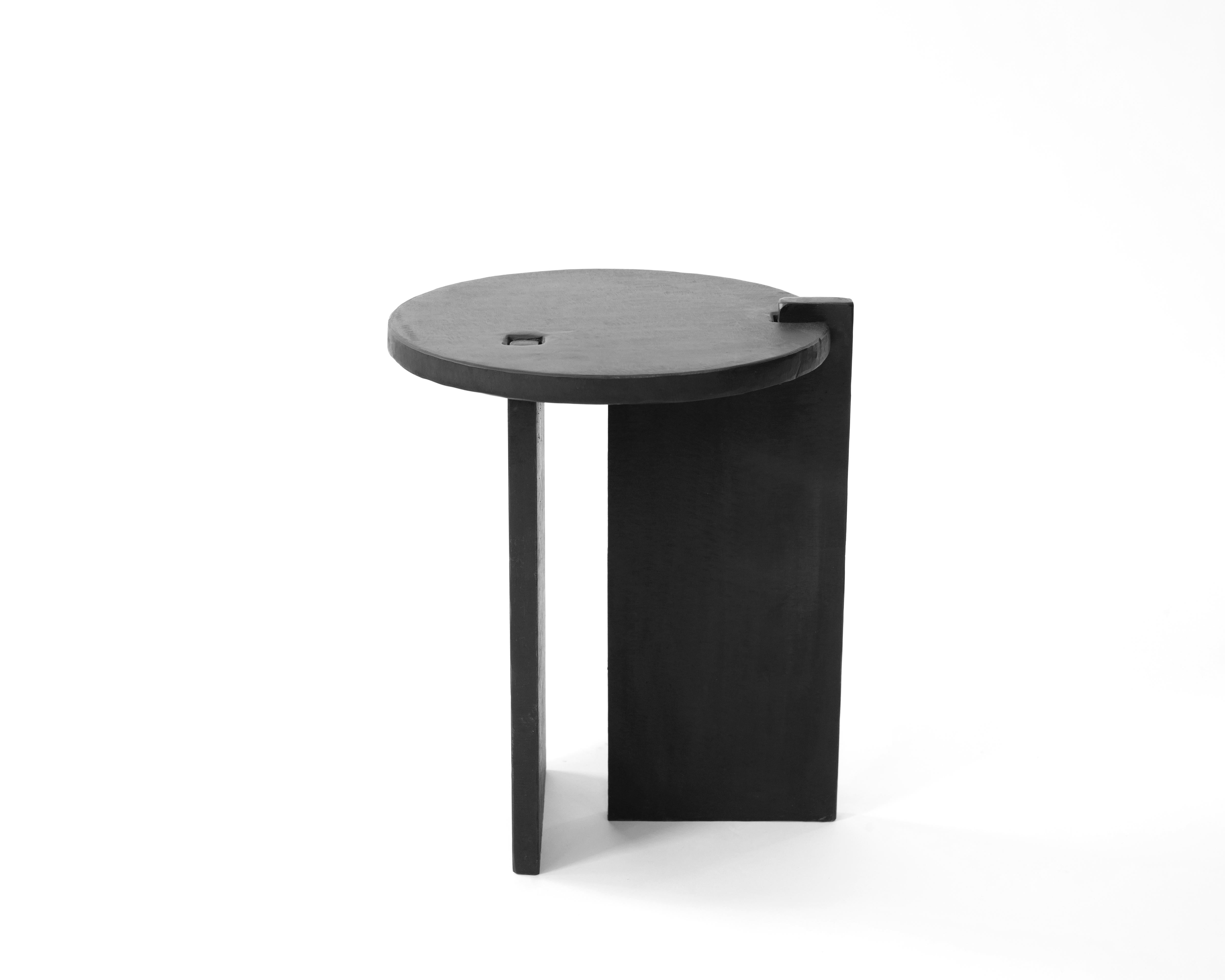 Table No. 8 - Stool or side table
J.M. Szymanski
d. 2021

A perfectly simple stool or side table. Solid 3/4” steel
components are combined to make a dynamic form. Finished in black wax.

Custom sizes and finishes available. Made in the Bronx, New