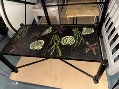 Table Cocktail (Motif Océan) par Jacques Adnet