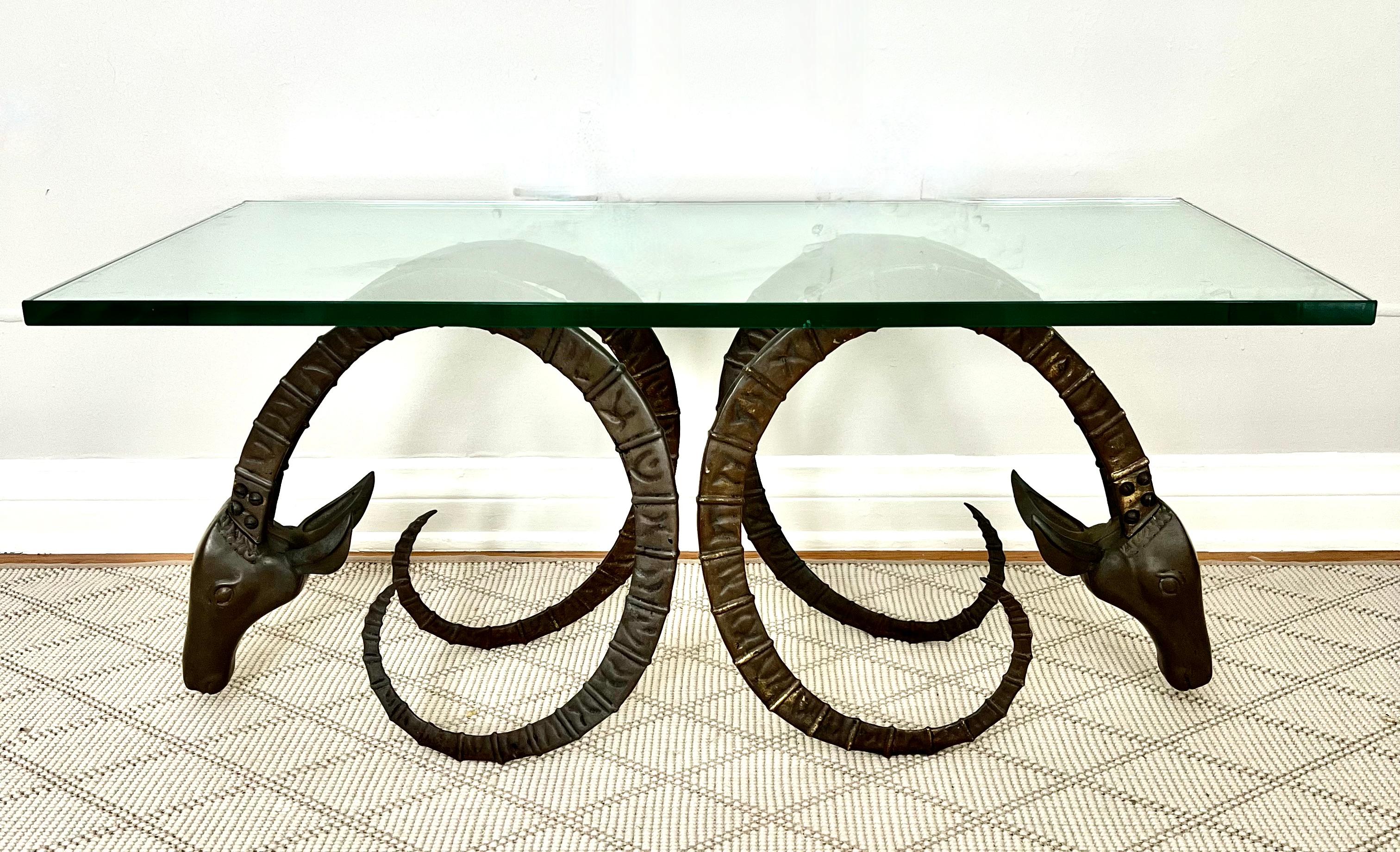 French Cocktail Table with a Pair of Brass Rams Heads in the Style of Alain Chervet For Sale