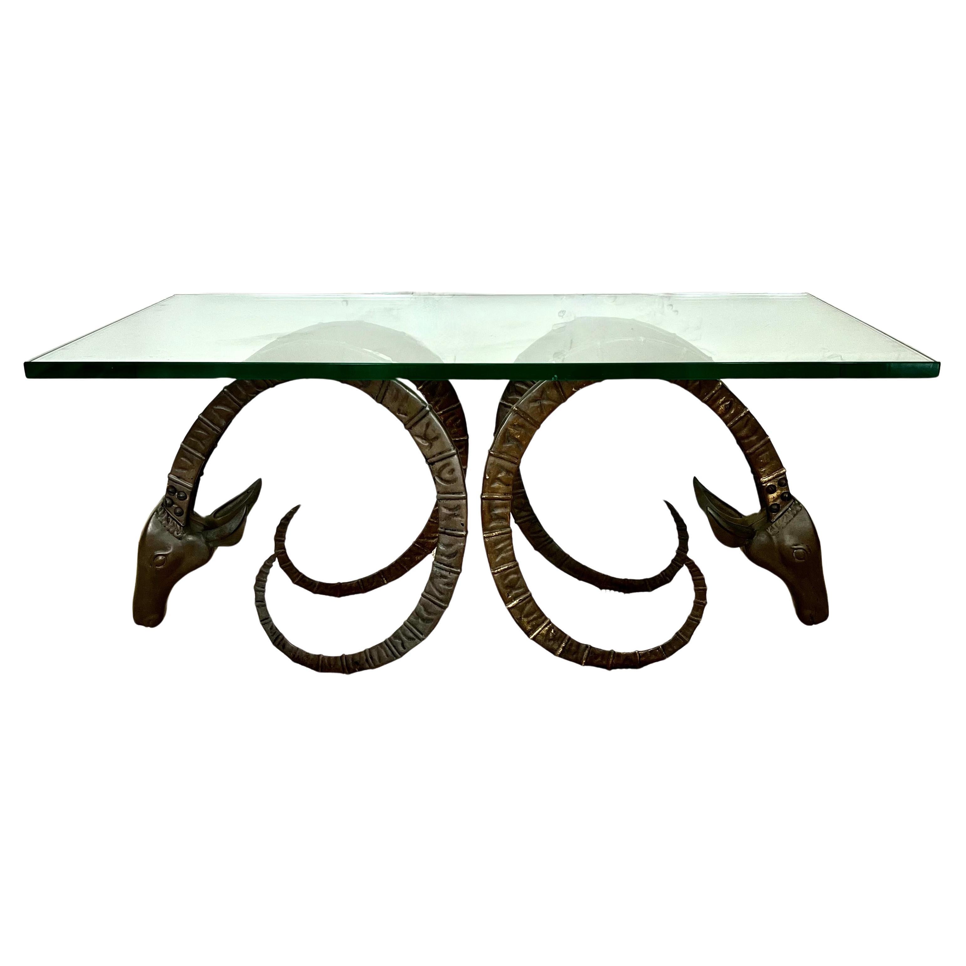 Cocktail Table with a Pair of Brass Rams Heads in the Style of Alain Chervet For Sale