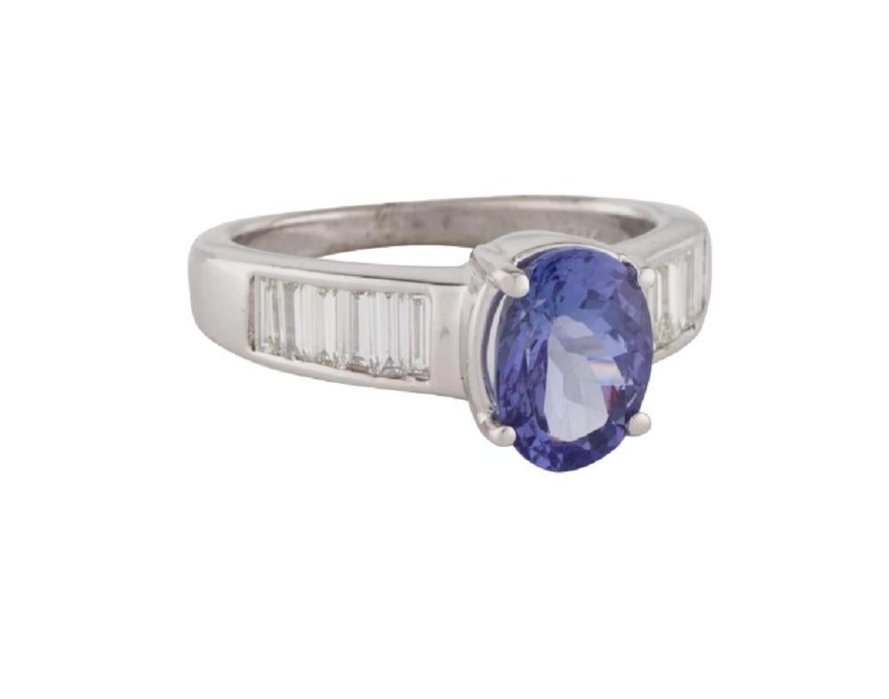 This is a gorgeous tanzanite &  diamond ring stamped in solid 18K white gold. The mesmerizing round brilliant diamonds and oval brillant  have an excellent look and is set on top of a timeless 18K white gold band.

*****
Details:
►Metal: White