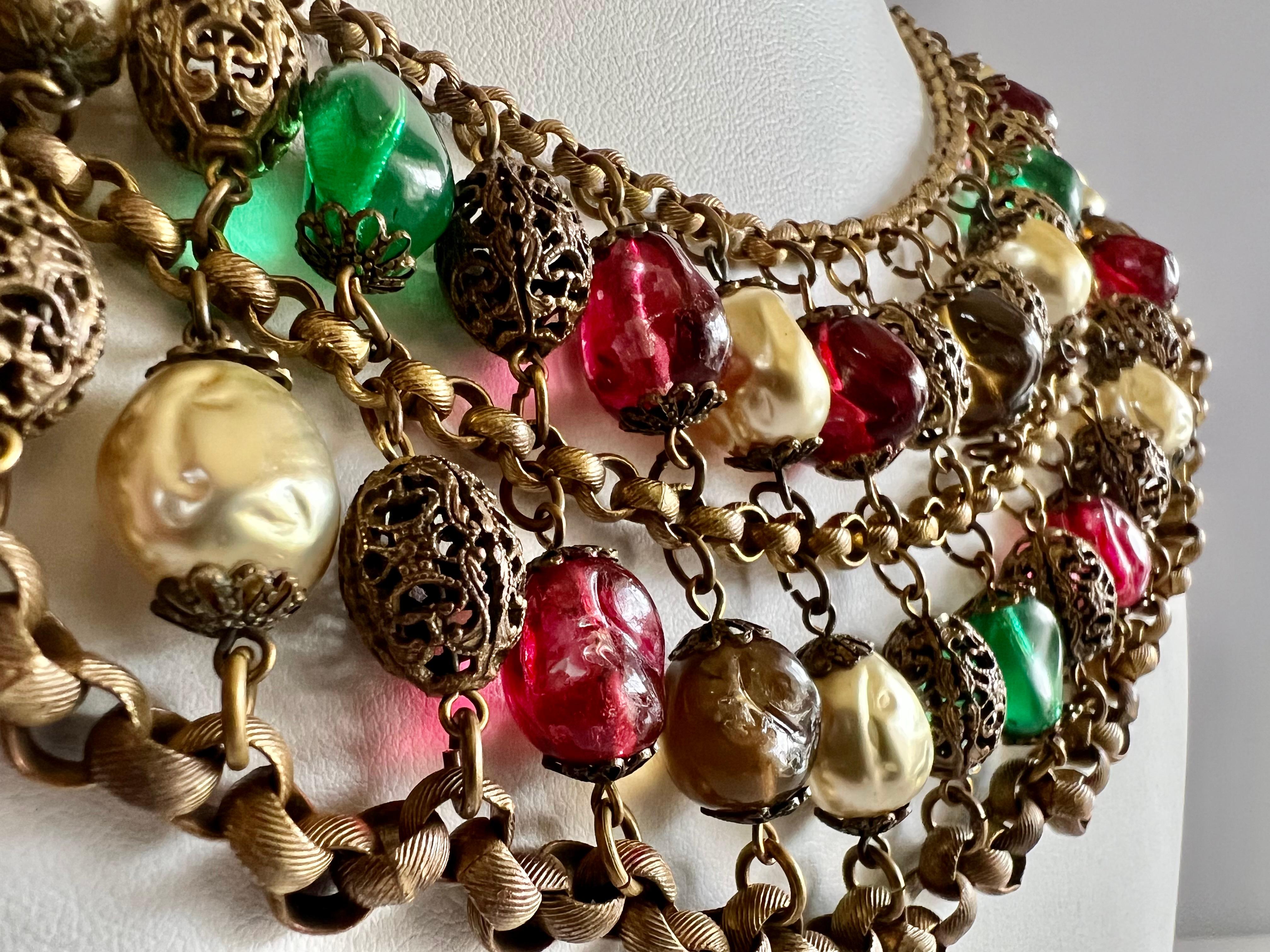 Exquisite and scarce Coco Chanel collar - the necklace is comprised of four rows of thick gilt metal chain interwoven with gilt metal filigree beads 