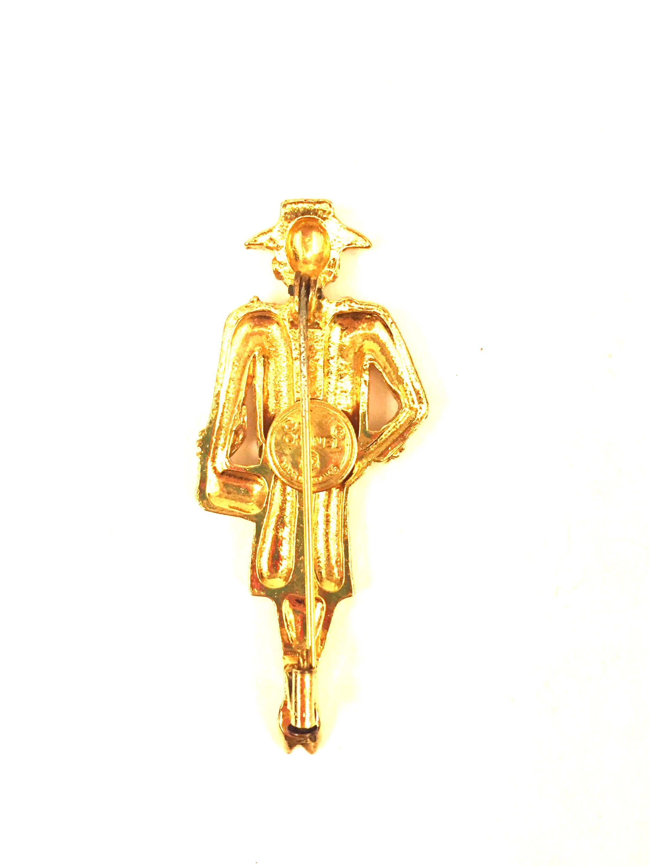 - VIntage 90s Coco Chanel gold plated brooch. Rare and gorgeous brooch. 

- Measurements: 6cm x 2.5cm  