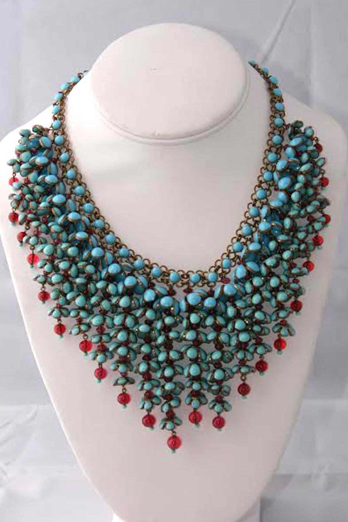 This special RARE and magnificent early statement necklace by Coco Chanel is simply put, among the rarest and most magnificent pieces of jewelry to ever cross this lifelong dealer's path. Constructed of inverted descending pendant flower clusters