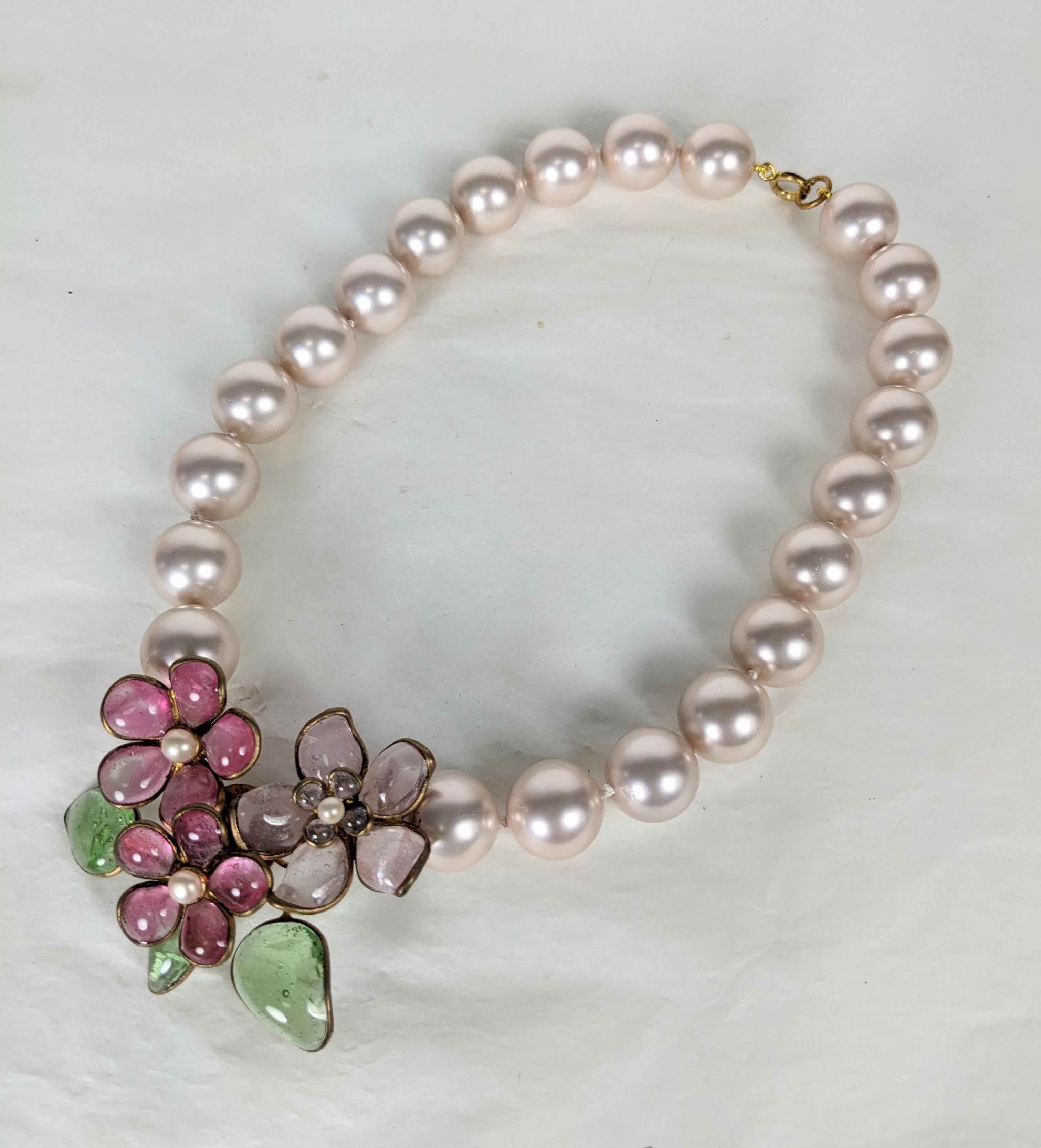 CoCo Chanel Maison Gripoix  Flower Necklace circa 1960. Of pink Gripoix hand knotted faux pearls with a floral centerpiece of poured Gripoix glass enamel florals in pink, amythest and pale emerald leaves with faux pearl cabochons. Excellent