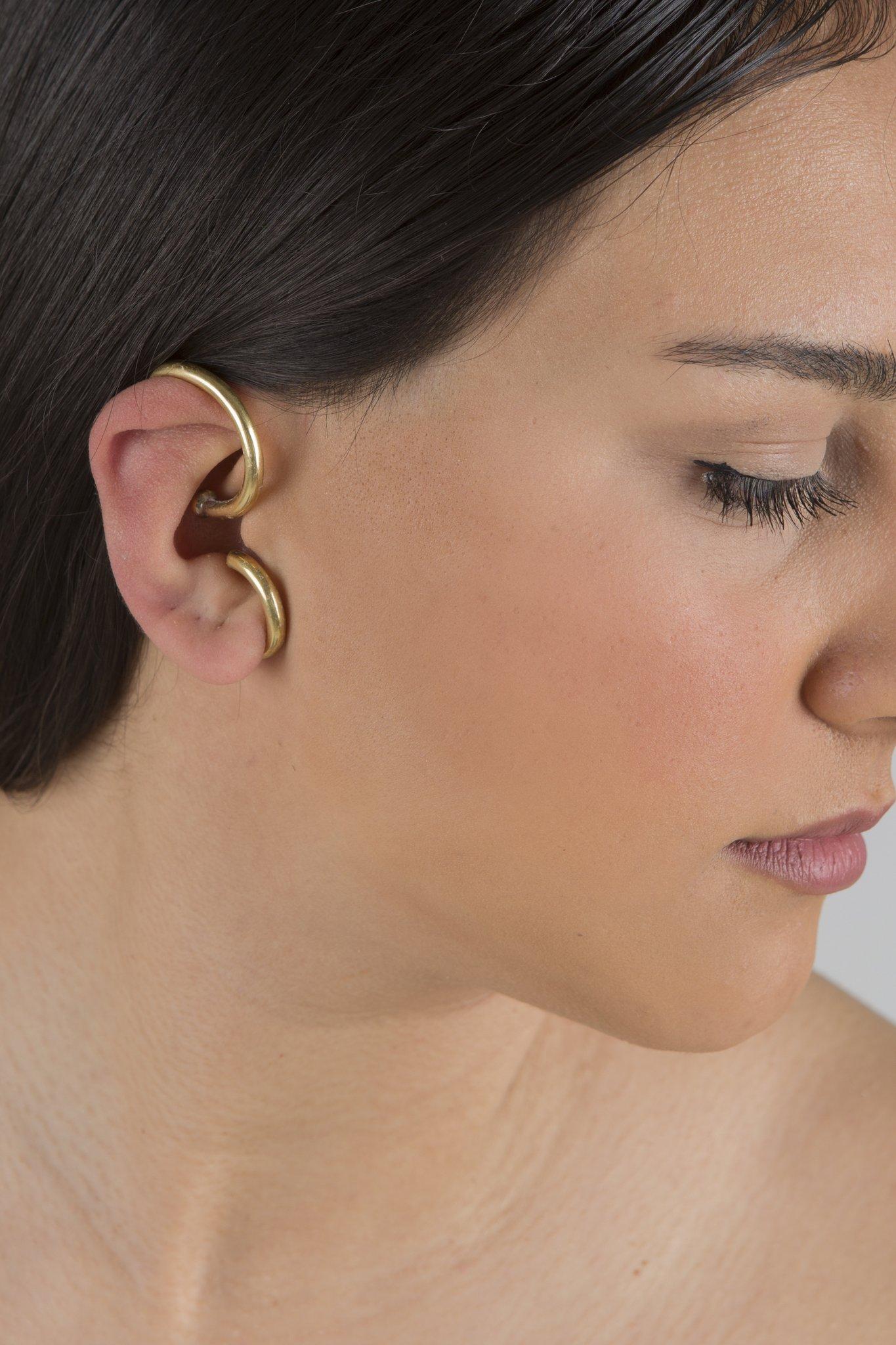 Playable, ergonomically designed ear cuff. The wire is flexible. User can adjust it by playing in hand.
