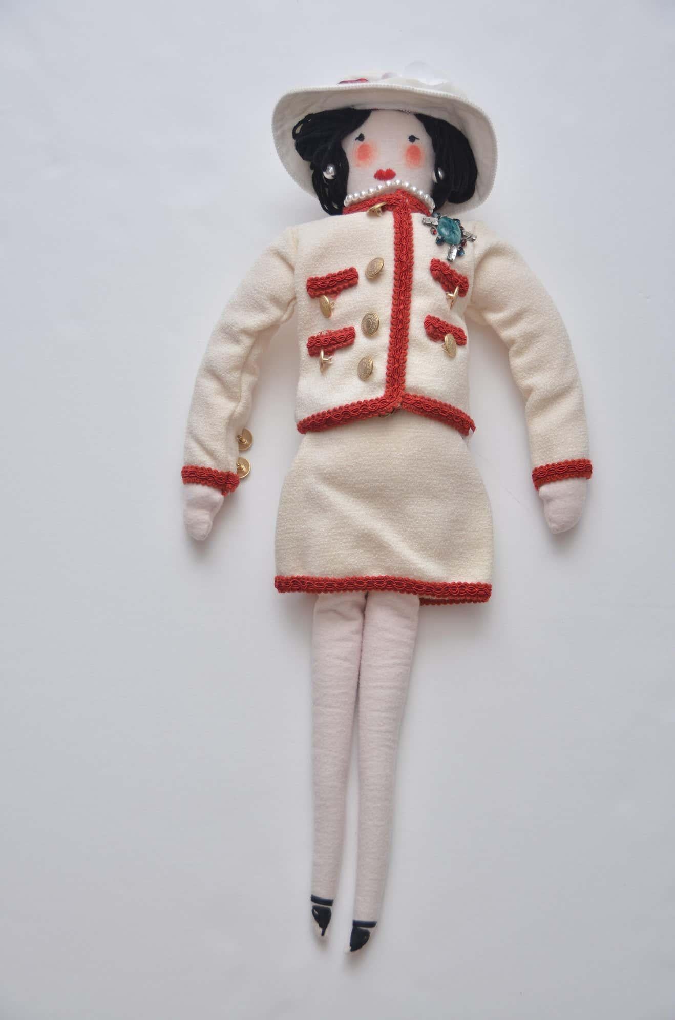 100% Authentic guaranteed 3 Chanel dolls designed by Karl Lagerfeld in 2010. Each doll has slightly different face because they where all handmade in France.  Chanel Mademoiselle doll was designed by Karl Lagerfeld For Chanel windows and given as