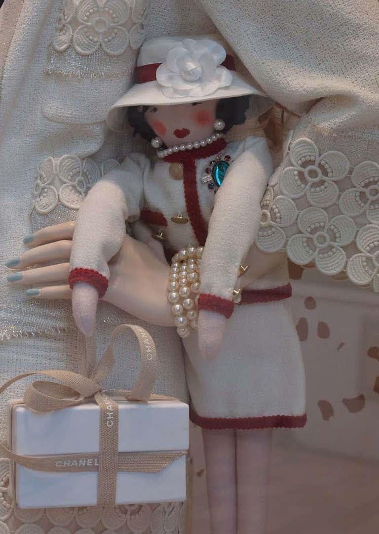 100% Authentic guaranteed Chanel designed by Karl Lagerfeld.
Each doll has slightly different face because they where all handmade.

Chanel Mademoiselle doll was designed by Karl Lagerfeld For Chanel windows and given as gift to special clients.