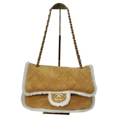 Borsa Coco Neige con patta in pelle scamosciata trapuntata e shearling grande