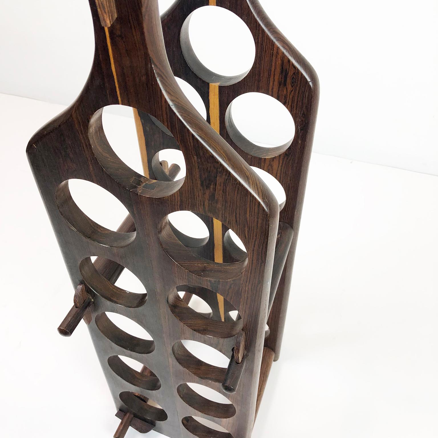 This amazing wine rack are made of cocobolo wood, attributed to Don Shoemaker, circa 1960. The rack holds eleven wine bottles and can be completely disassembled, excellent vintage condition.