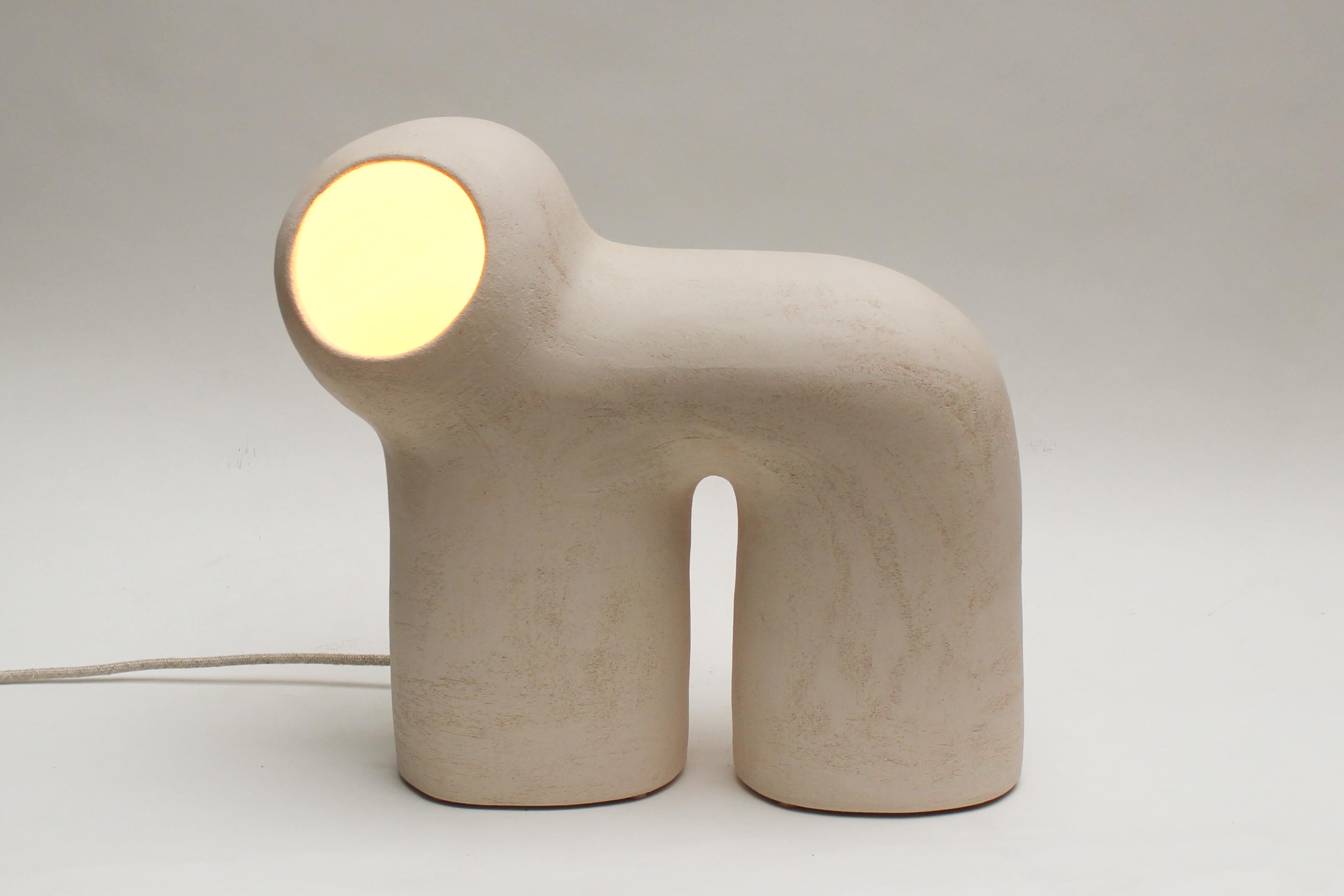 Cocon #5 White stoneware lamp by Elisa Uberti
Dimensions: High around 35/40 cm
Materials: White stoneware

After fifteen years in fashion, Elisa Uberti decides to take the time to work with these hands and to give birth to new