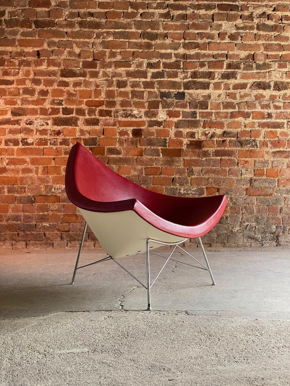 Coconut chair in red leather George Nelson by Vitra 2006

Superb mid-century modern design George Nelson coconut chair finished in Red leather and produced by Vitra dated 2006, the Coconut shaped white shell is upholstered in red leather and