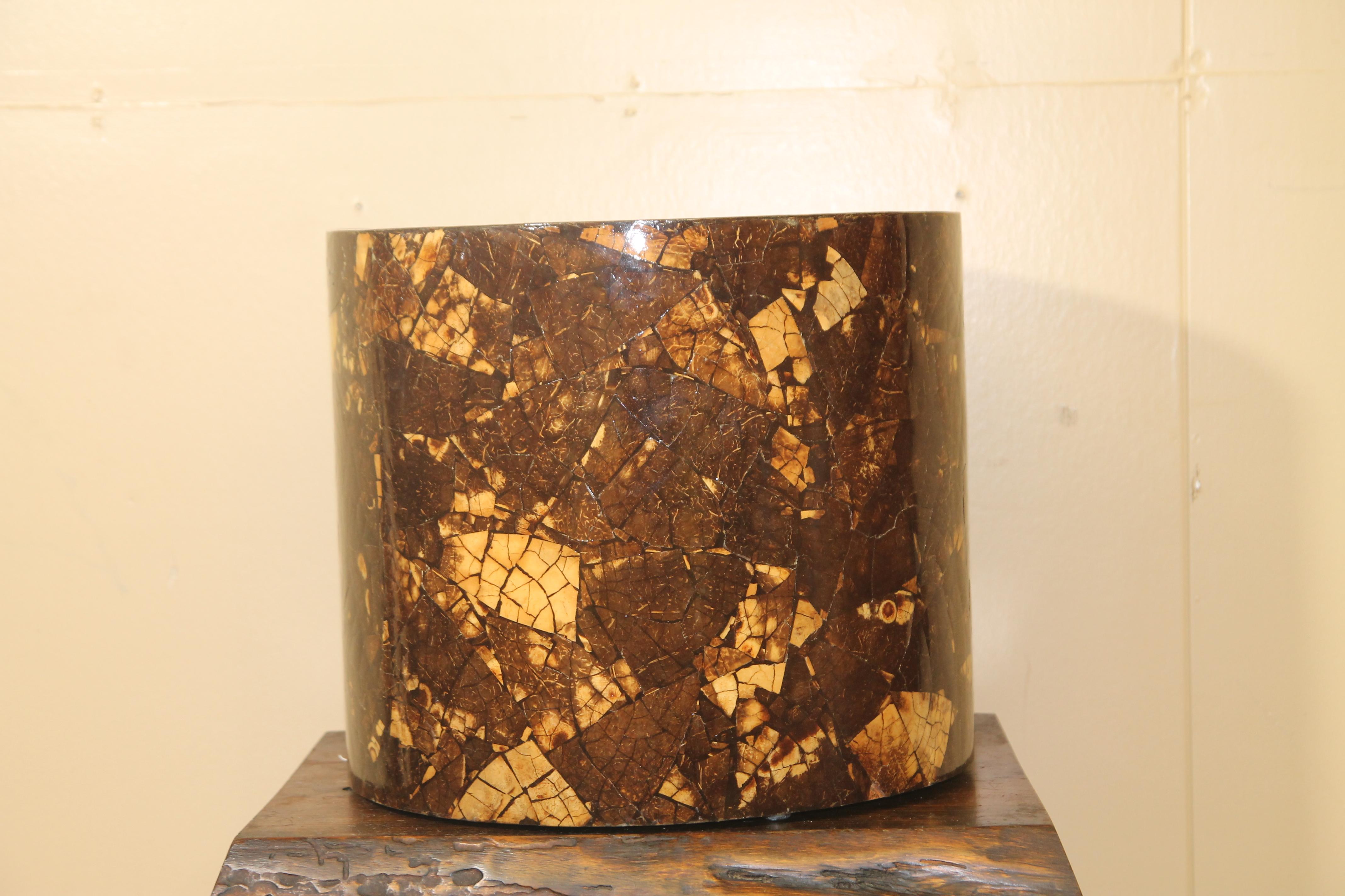Wonderful oversized coconut shell can in the style of Karl Springer. This piece has a number of uses including using as a coffee table base with a glass top.