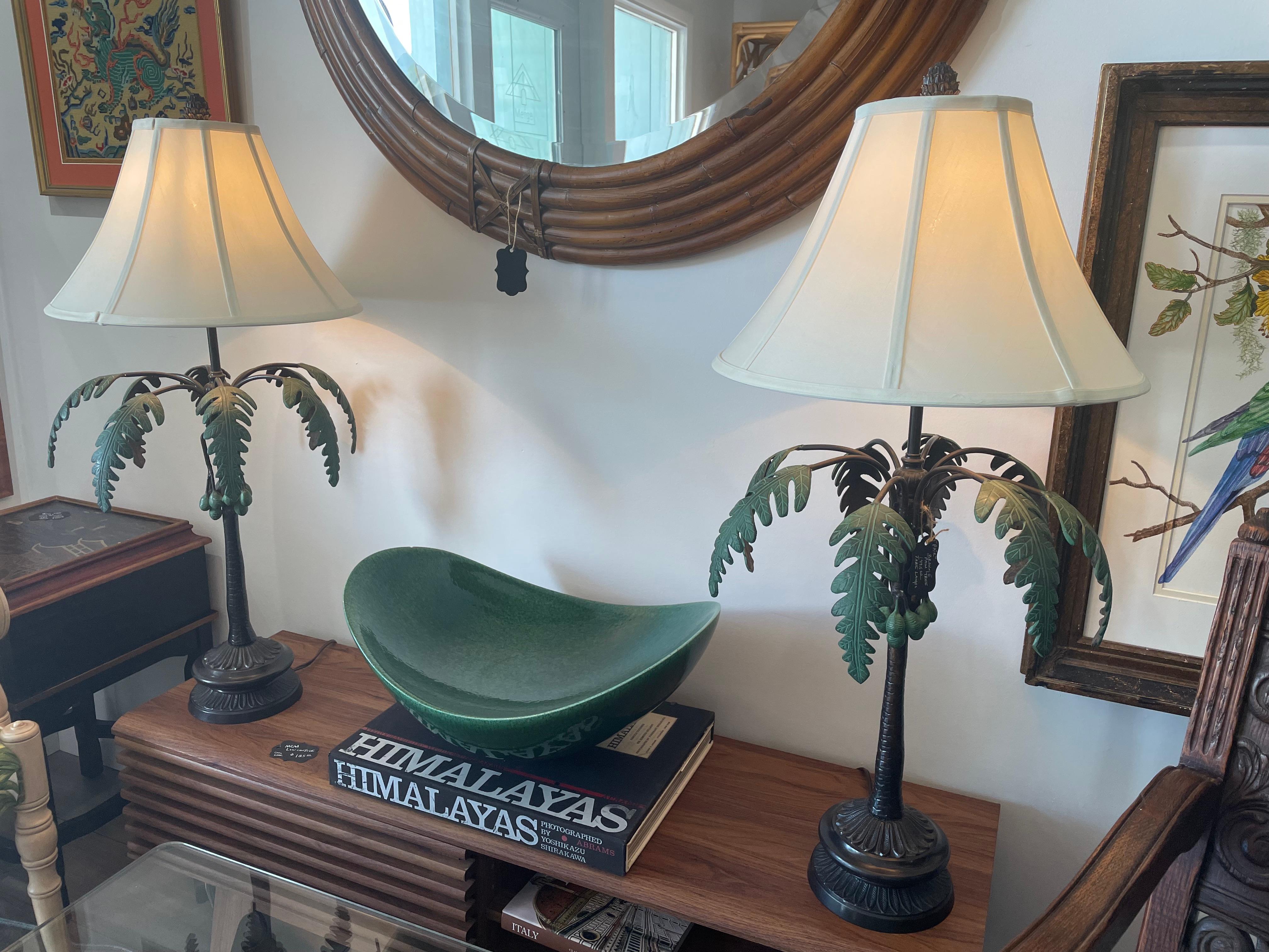Beautiful coconut tree tables lamps, bronze stems, base and leaves. They are super beautiful in person, you can see that they are hand painted. I am including the lamp shades which are new as well as the finials. Tropical elegance yet can be seen in