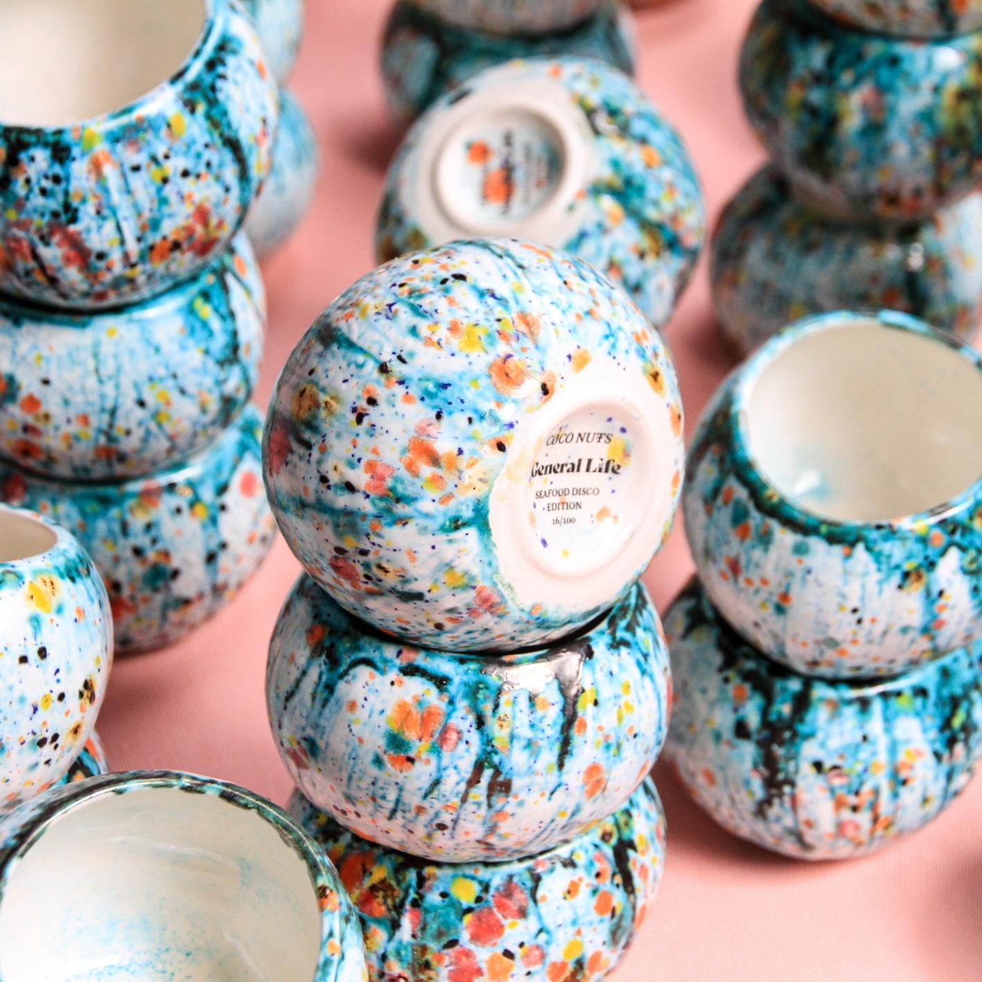 Out of a period of joyful exuberance General Life have created a new limited edition of just 100 of their CØCO NUTS cups in a new ‘SEAFØØD DISCO’ glaze inspired by nougat, prawns, art nouveau, cheetahs and Argentinian street art. These are tactile