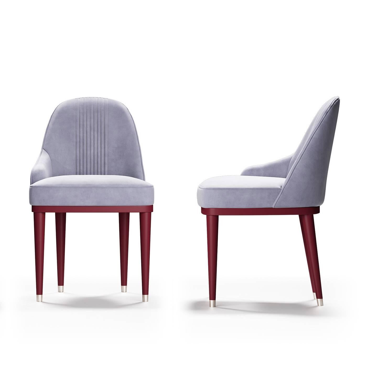 A daring blend of modern aesthetic and expert craftsmanship, this unique dining chair will be a timeless accent in a modern-style home. Reminiscent of innovative Bauhaus furniture, this chair features a round back and just one armrest (please