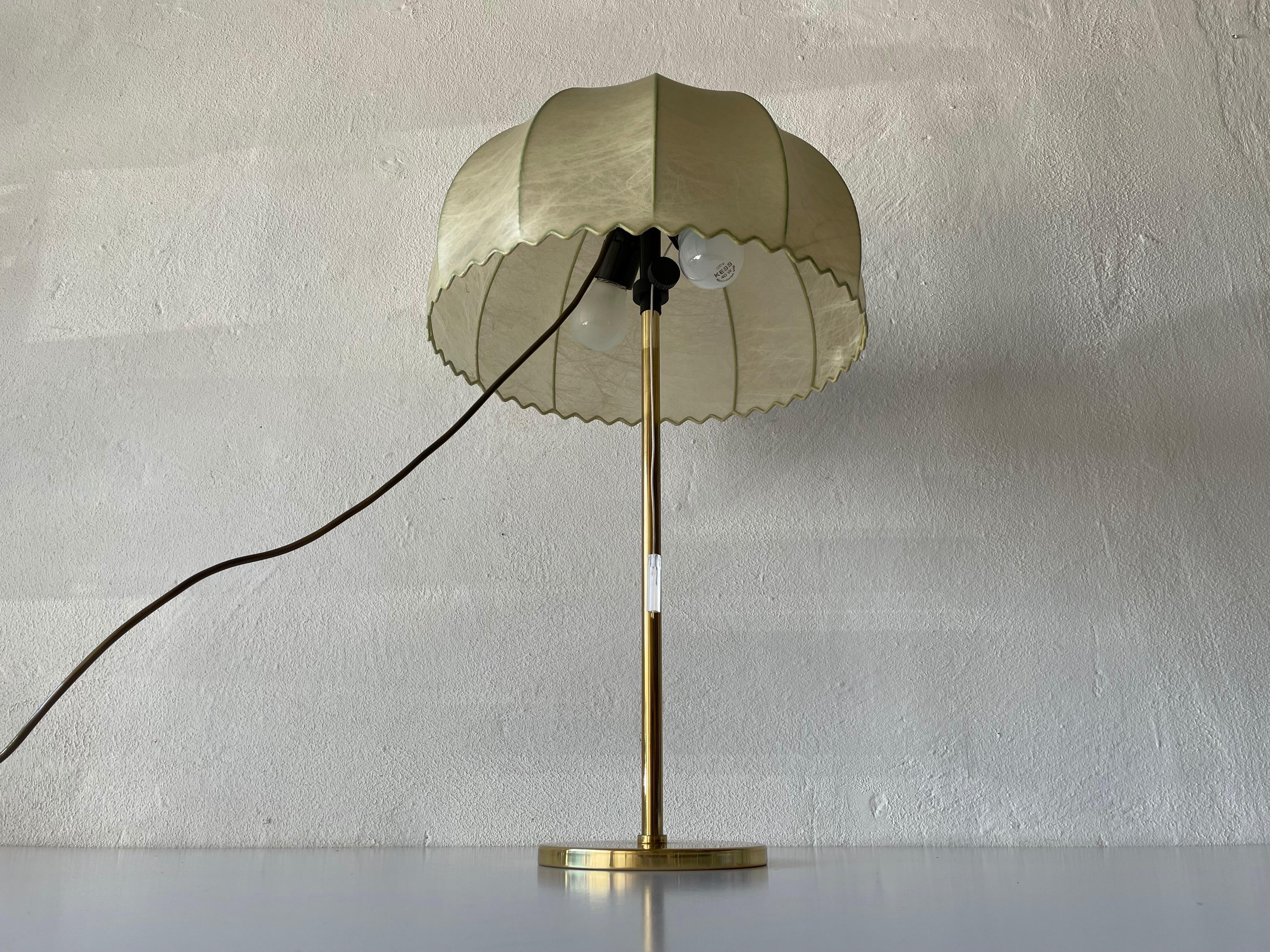 Cocoon adjustable height table lamp by Goldkant, 1970s, Germany

Lamp height can be shortened.
 
Cocoon shades & metal body

Minimal and natural design
Very high quality.
Fully functional.
Original cable and plug. These lamps are suitable