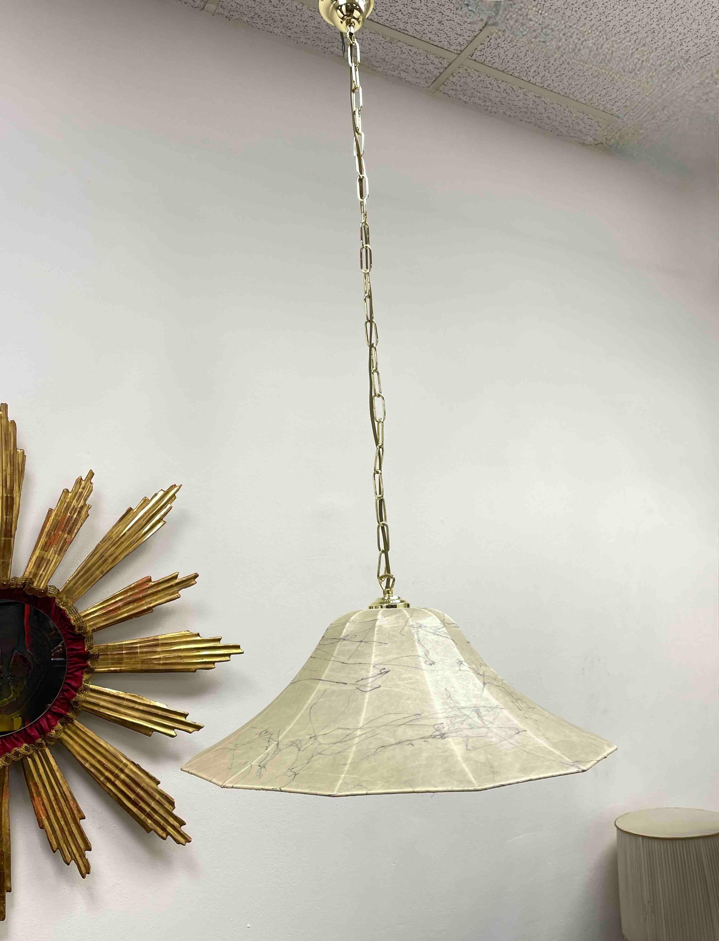 A beautifully Cocoon pendant light made by Goldkant, 1960s Germany, comes from the Achille Castiglioni Era. Lampshade is in very good vintage condition. Brass chain with canopy is approx. 41