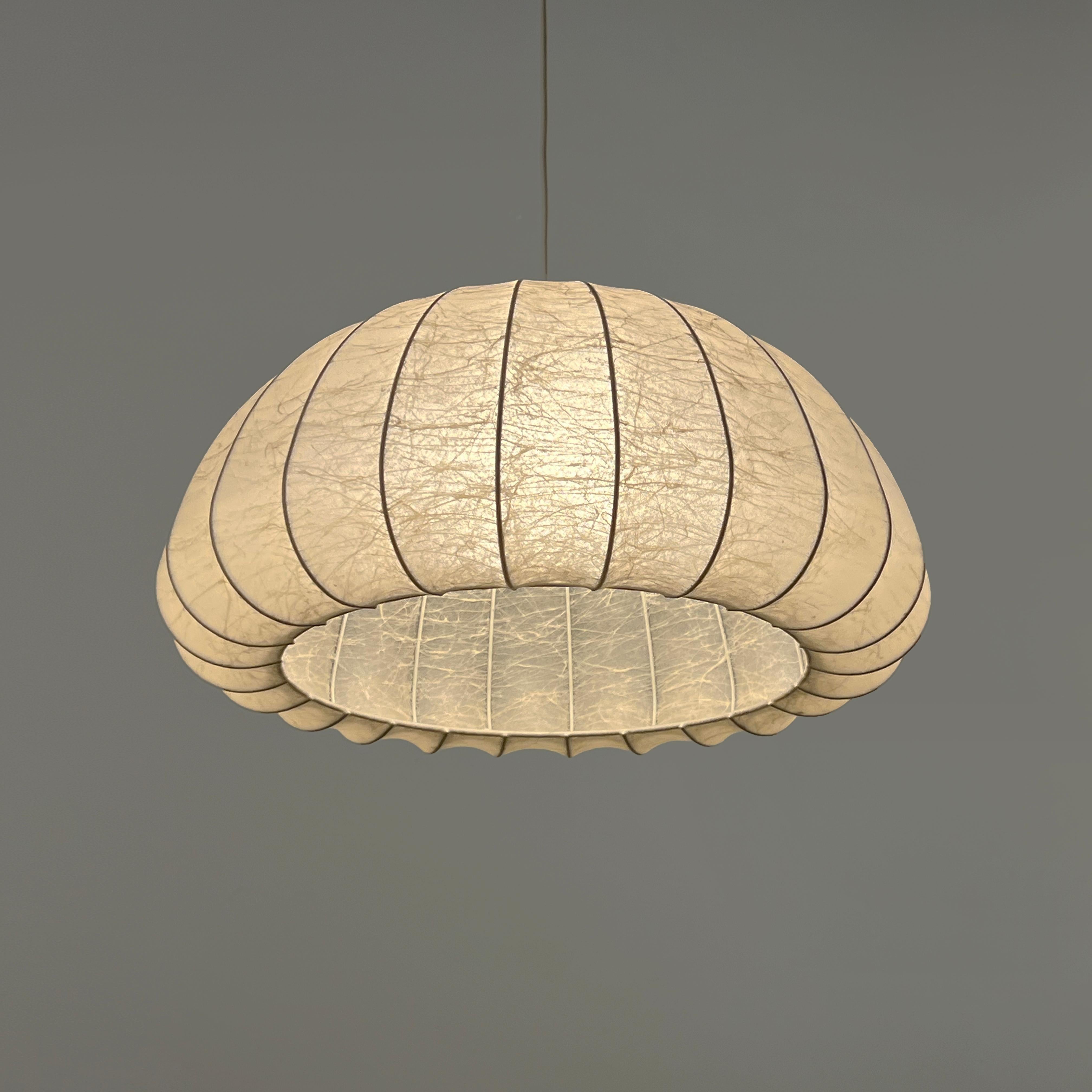 Cocoon chandelier attributed to Friedel Wauer for Goldkant Leuchten, Germany 1970s

This exquisitely elegant cocoon chandelier attributed to Friedel Wauer for the Goldkant Leuchten in Germany during the 1970s showcases a very particular
