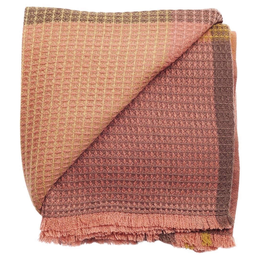 Throw artisanal Cocoon Merino dans des teintes neutres et chaudes