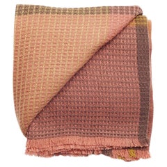 Throw artisanal Cocoon Merino dans des teintes neutres et chaudes