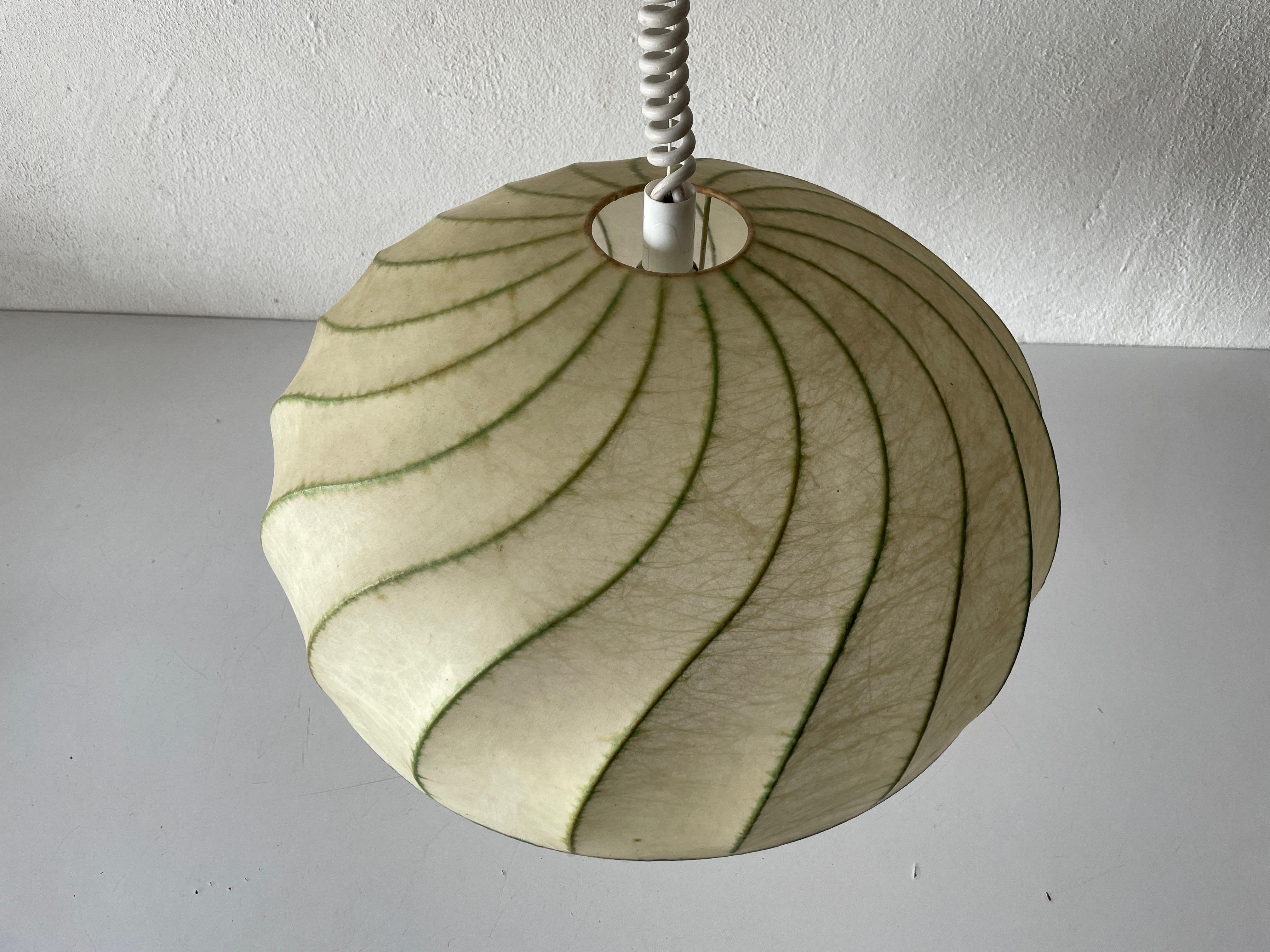 Cocoon Pendant Lamp by Goldkant, 1960s, Germany

Achille Castiglioni Era
1960s Germany.

Lampshade is in very good vintage condition.

This lamp works with E27 light bulbs. 
Wired and suitable to use with 220V and 110V for all